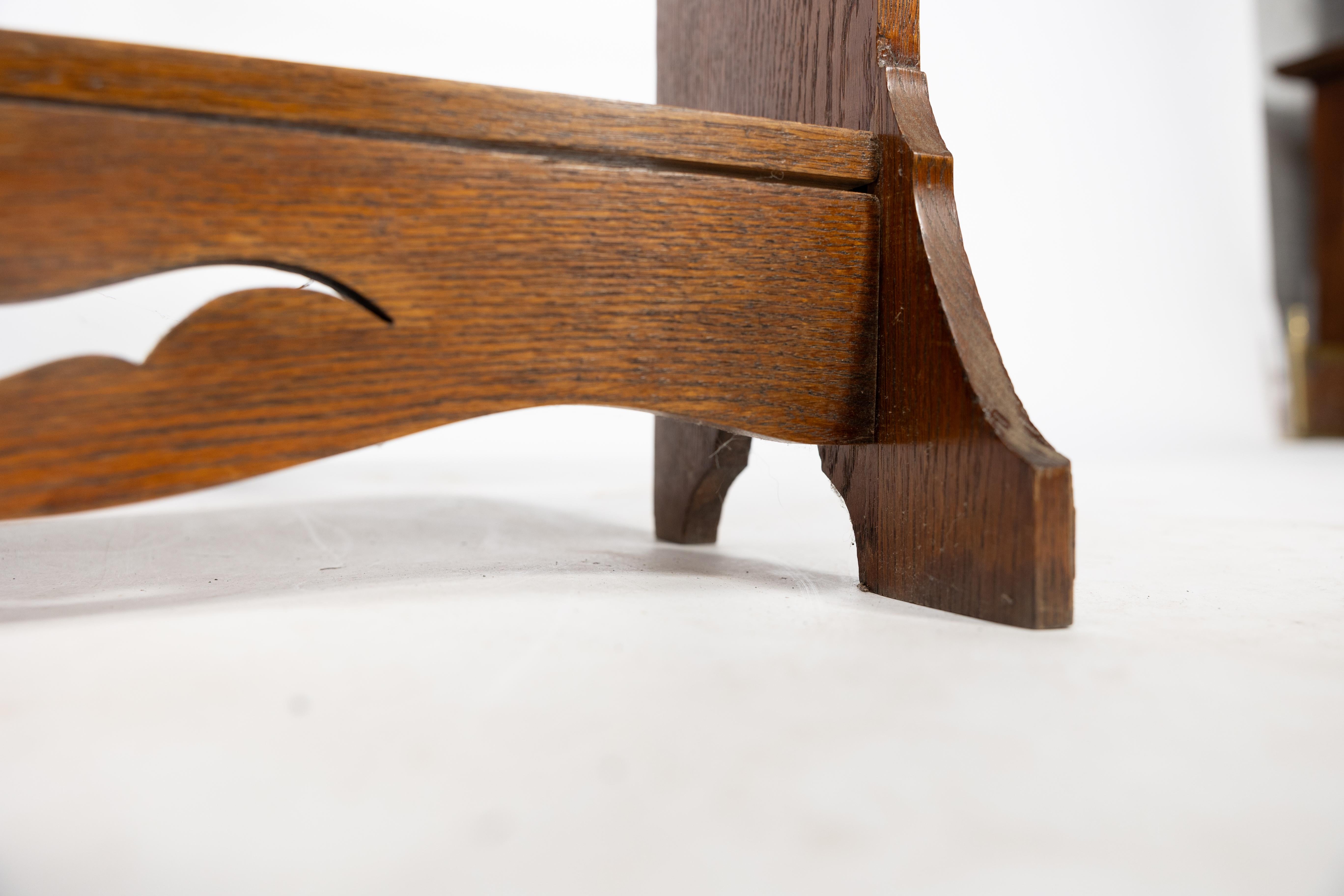 Liberty and Co. An Arts and Crafts golden oak bookcase flat packed For Sale 7