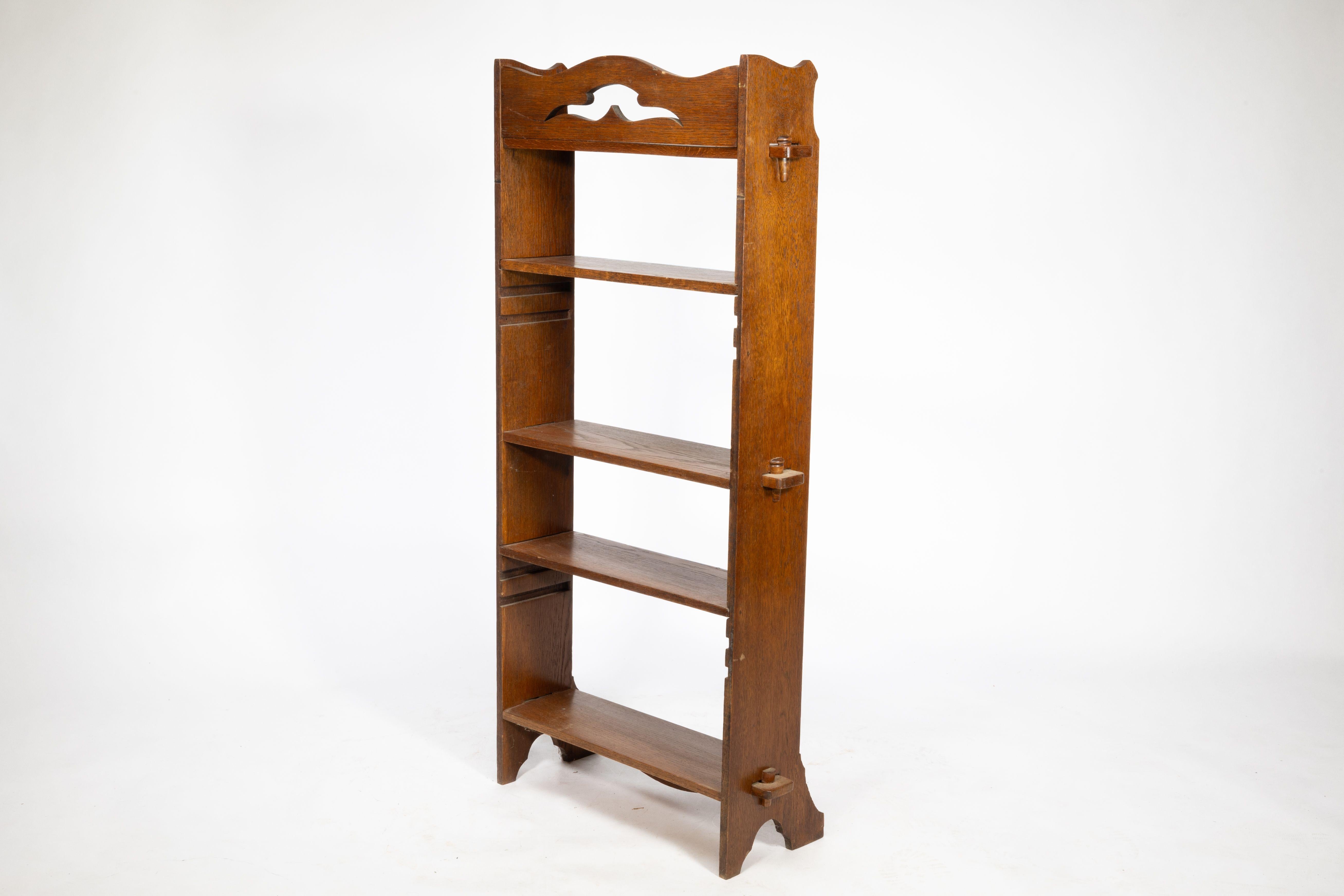 Oak Liberty and Co. An Arts and Crafts golden oak bookcase flat packed For Sale