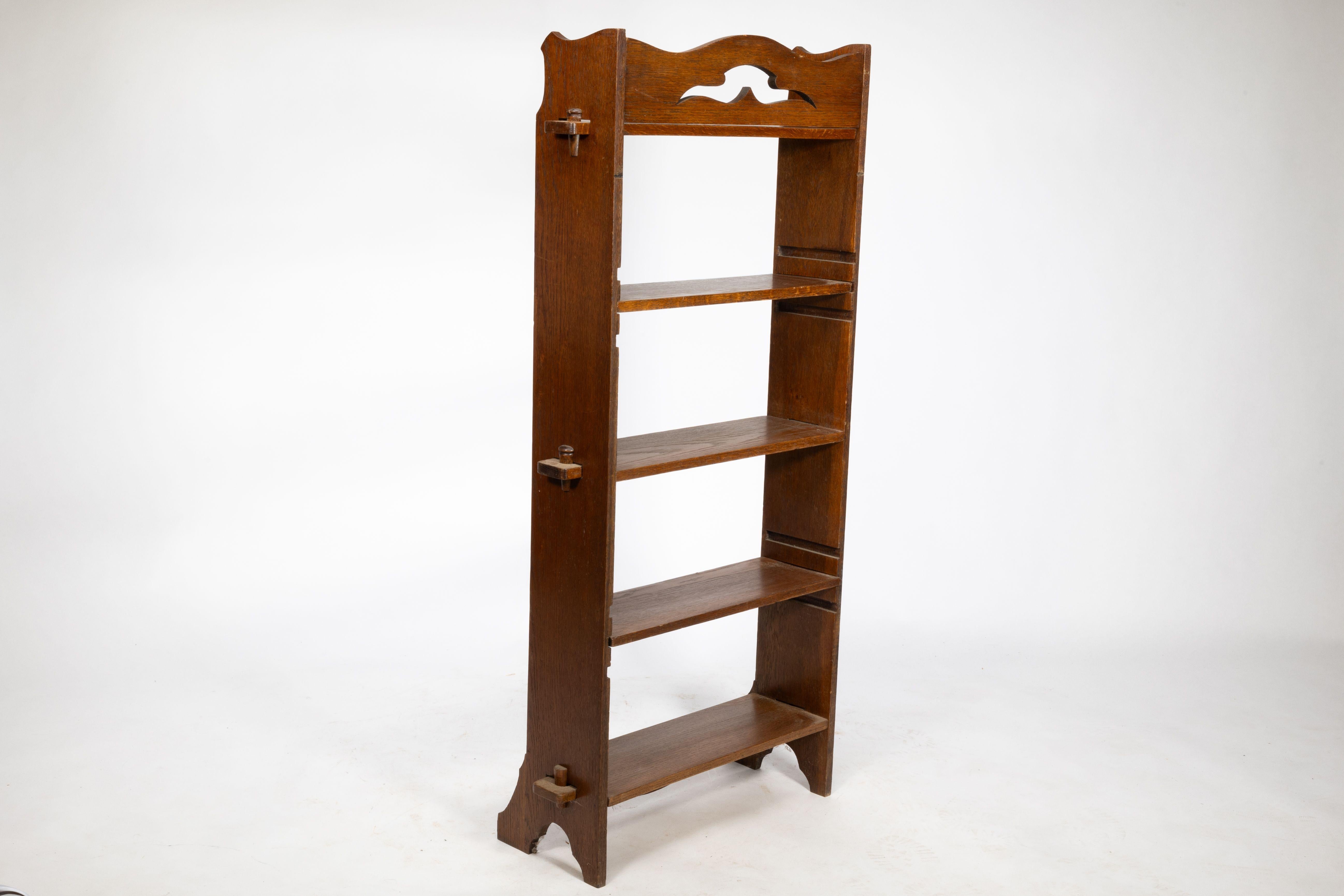 Liberty and Co. An Arts and Crafts golden oak bookcase flat packed For Sale 2