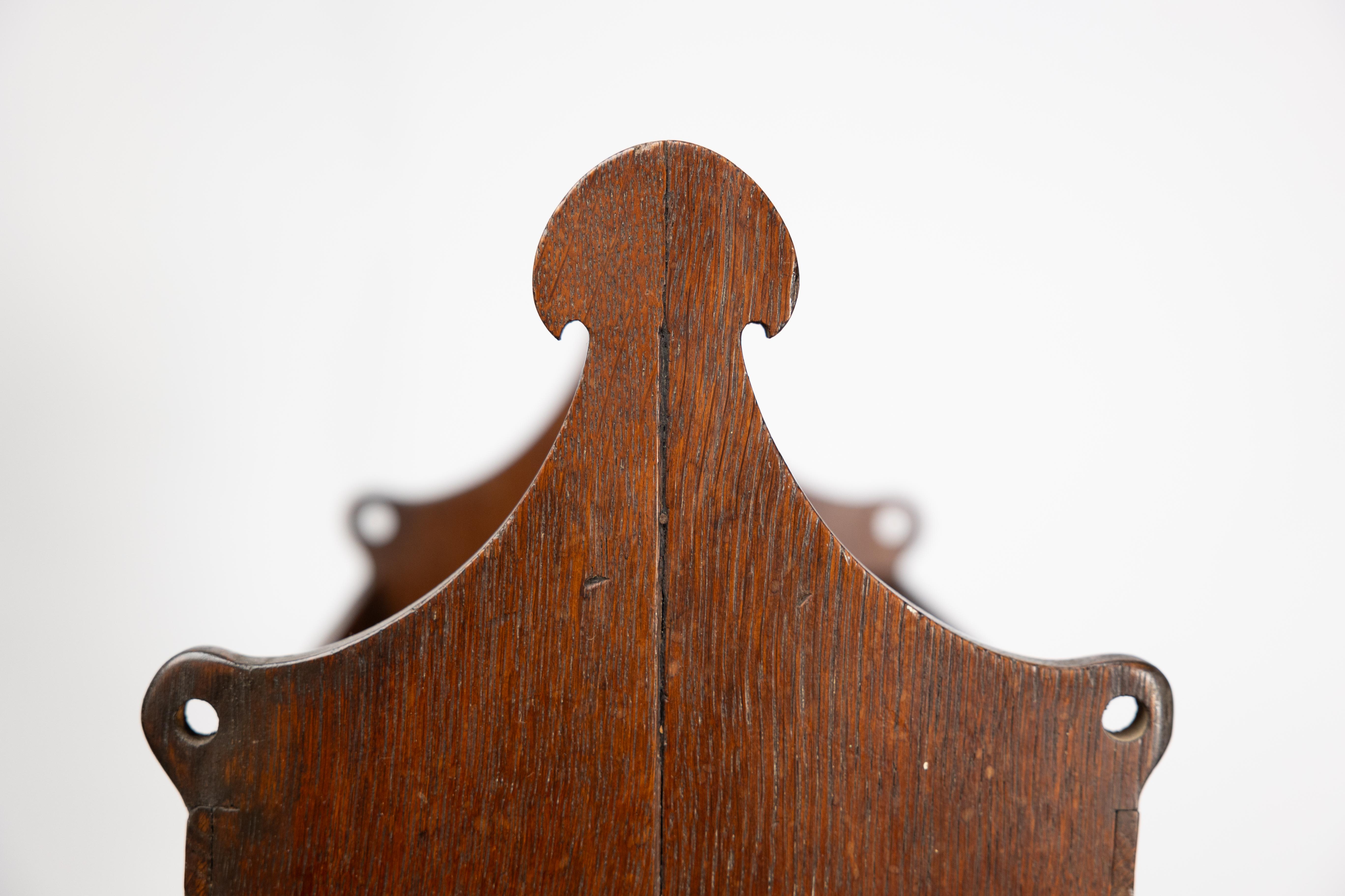 Liberty and Co. An Arts and Crafts oak magazine rack For Sale 5