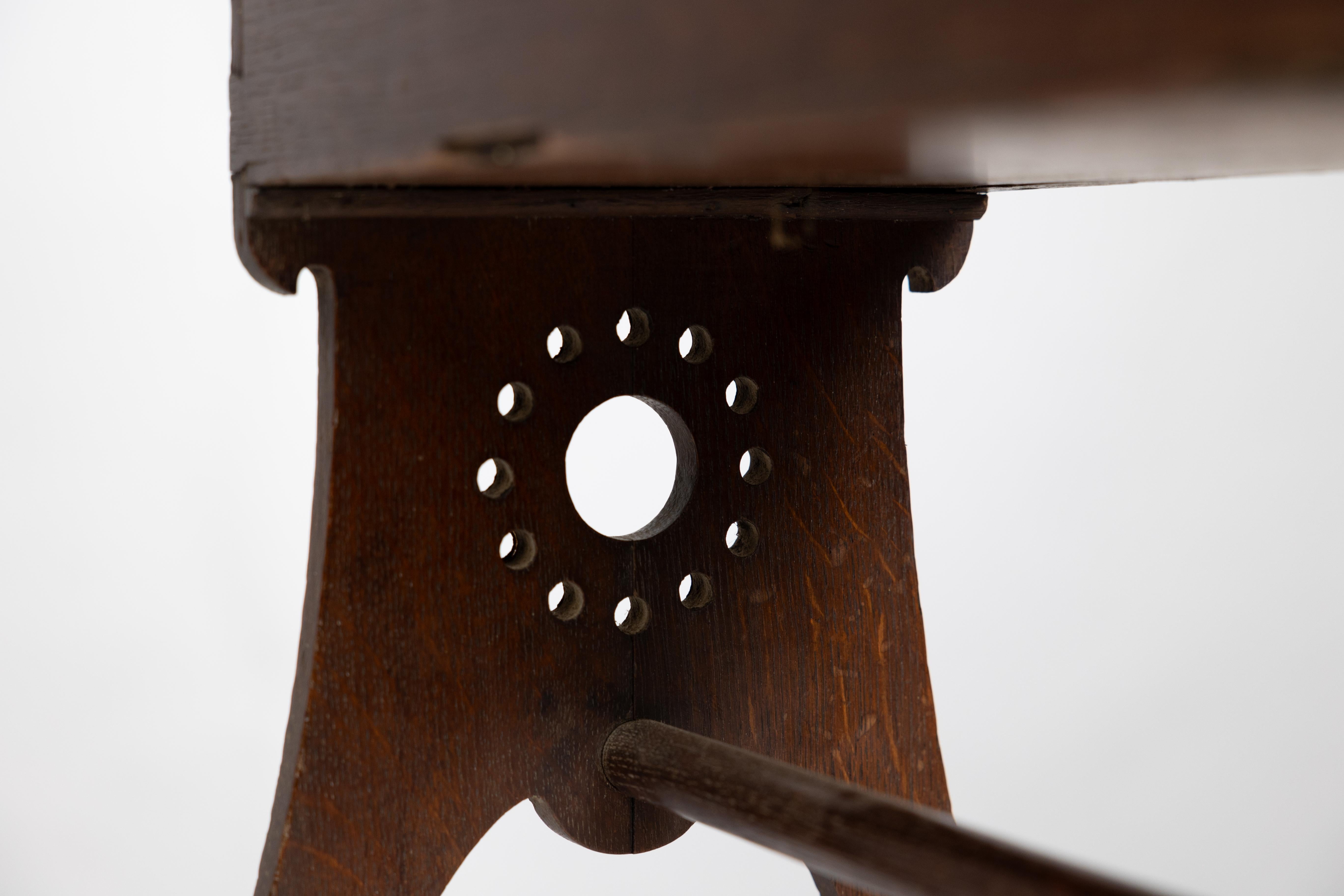 Liberty and Co. An Arts and Crafts oak magazine rack For Sale 9