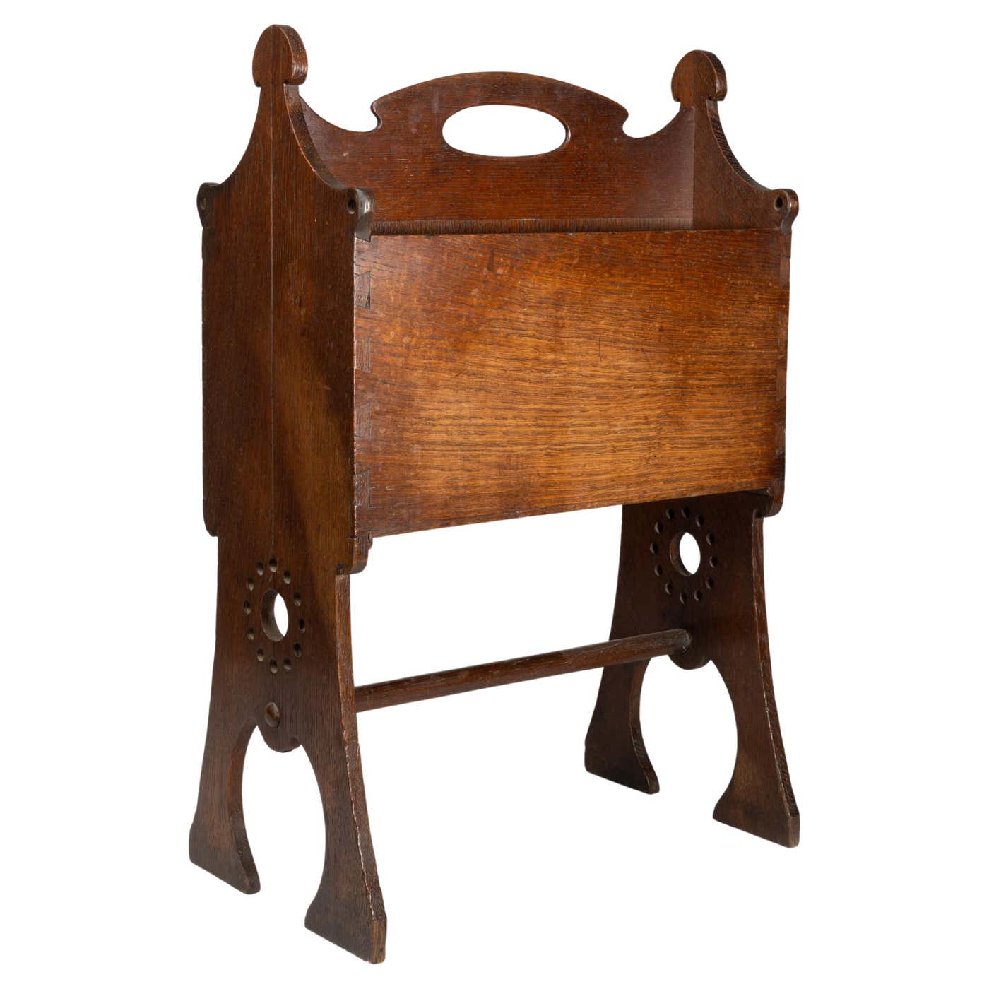 Liberty and Co. An Arts and Crafts oak magazine rack For Sale at 1stDibs