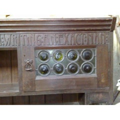 Liberty and Co. An Arts and Crafts oak over mantle or hanging bookshelf