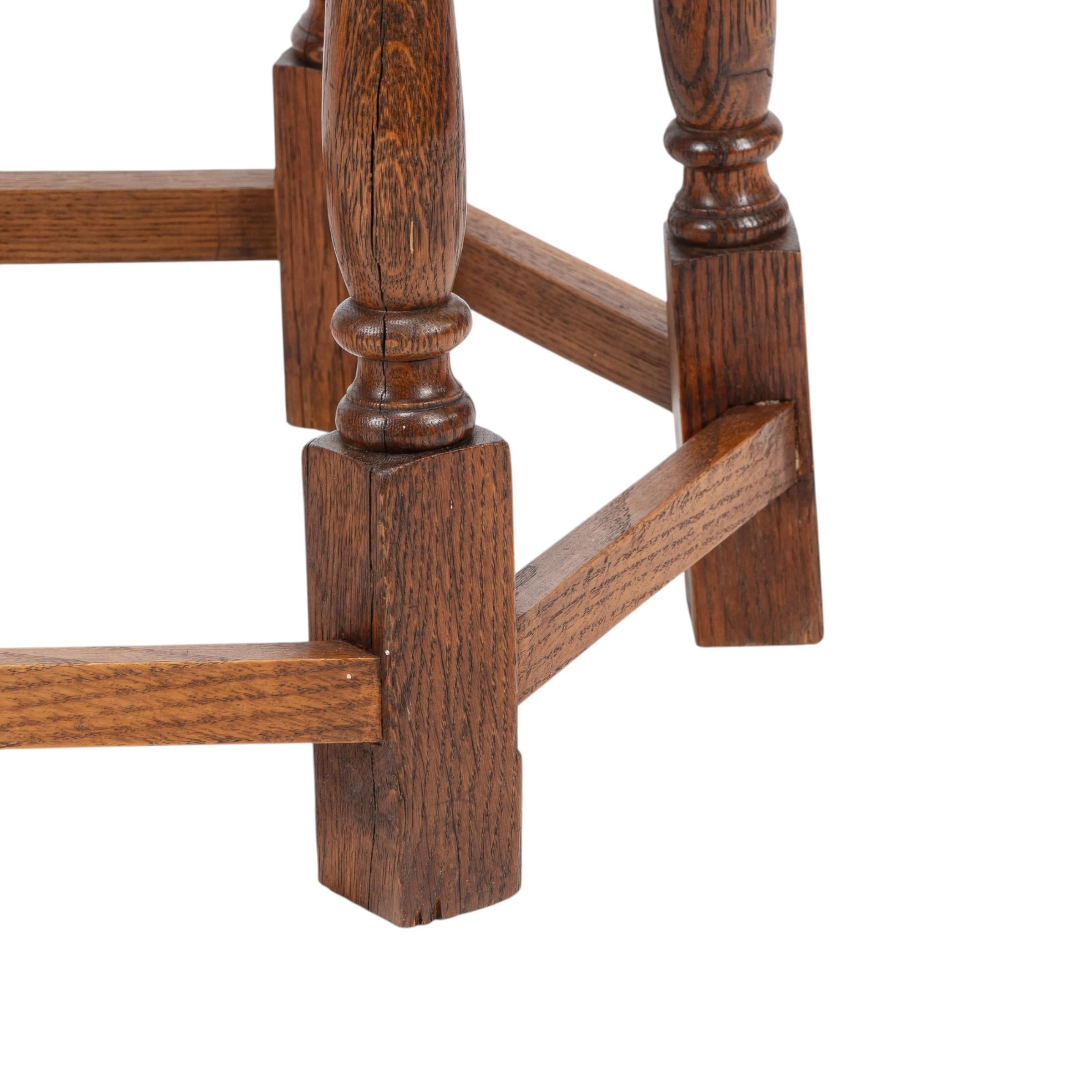 Liberty and Co. An Arts and Crafts oak side table with a hexagonal top For Sale 3