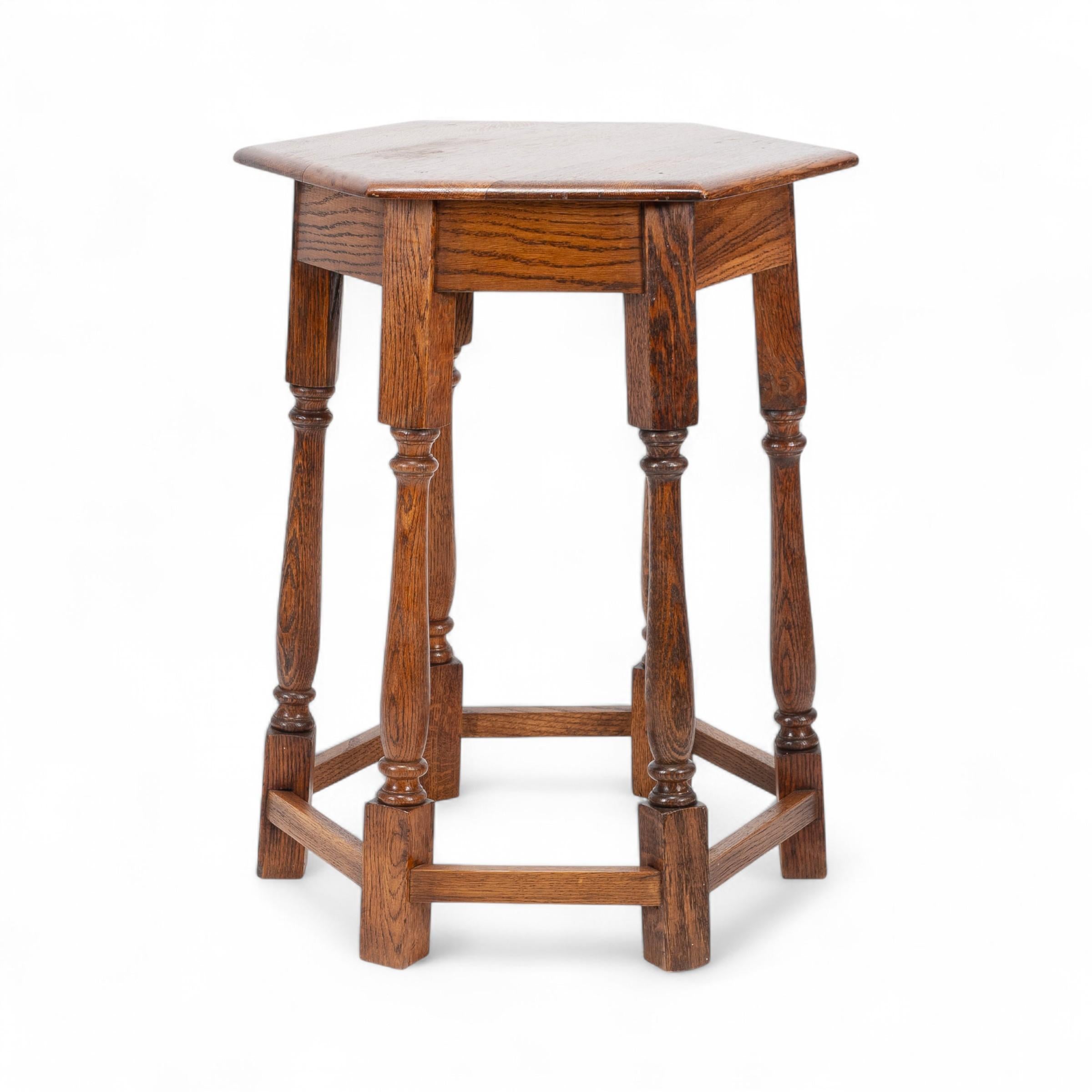 Liberty and Co. An Arts and Crafts oak side table with a hexagonal top In Good Condition For Sale In London, GB