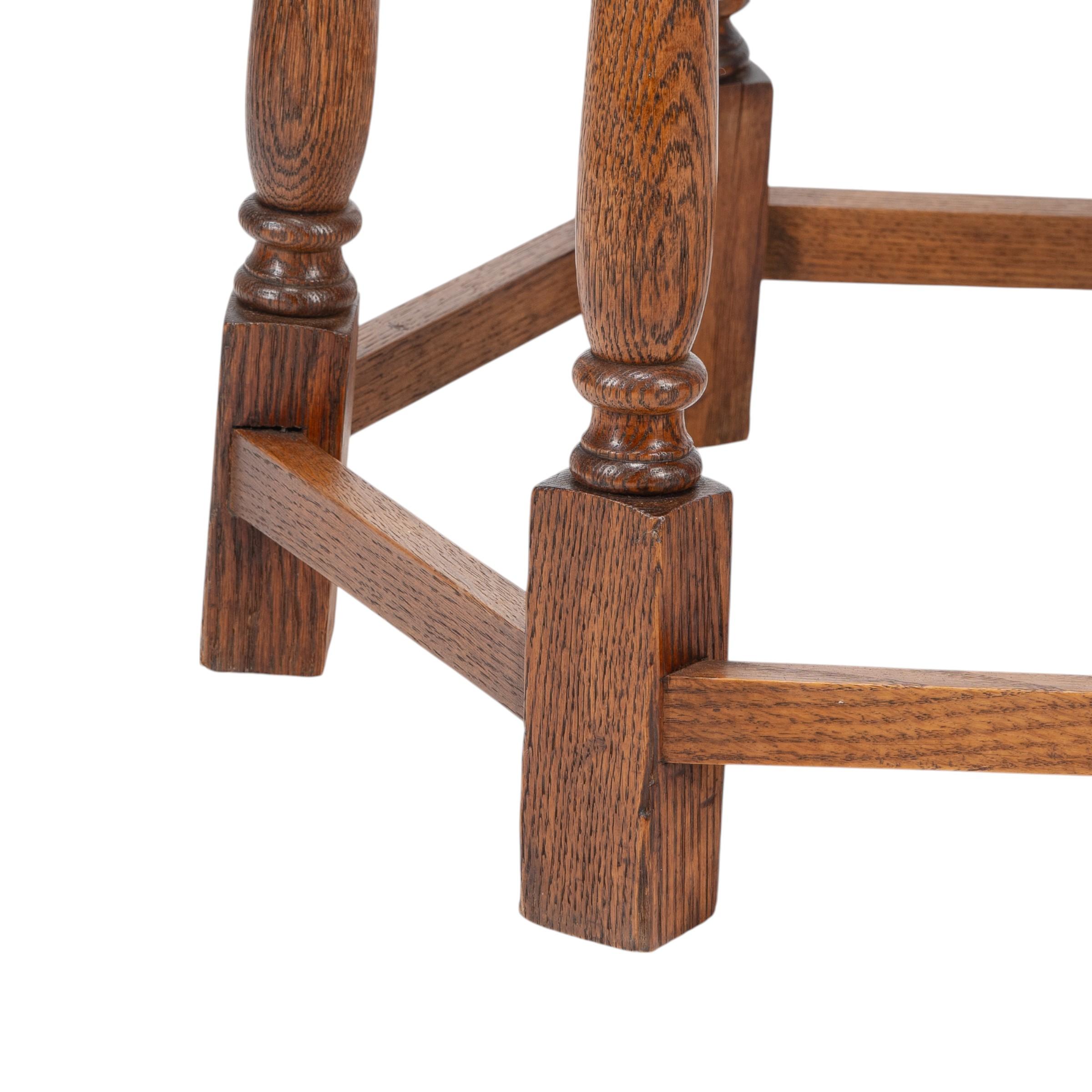 Liberty and Co. An Arts and Crafts oak side table with a hexagonal top For Sale 2