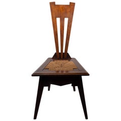 Liberty and Co. An Arts and Crafts Wiclif rush seat side chair.