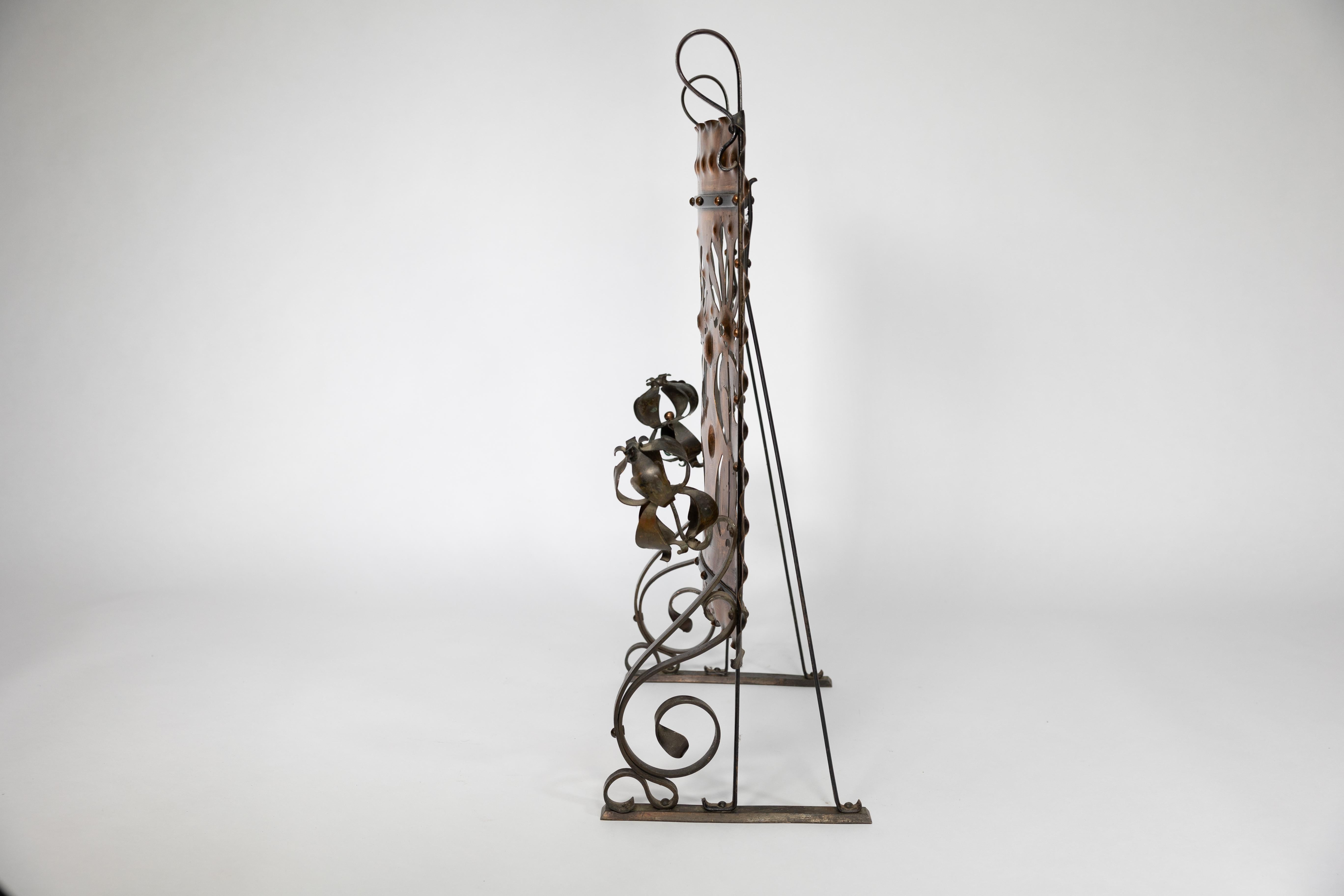 Arts and Crafts Liberty & Co. An Arts & Crafts wrought iron & copper pierced floral firescreen. For Sale