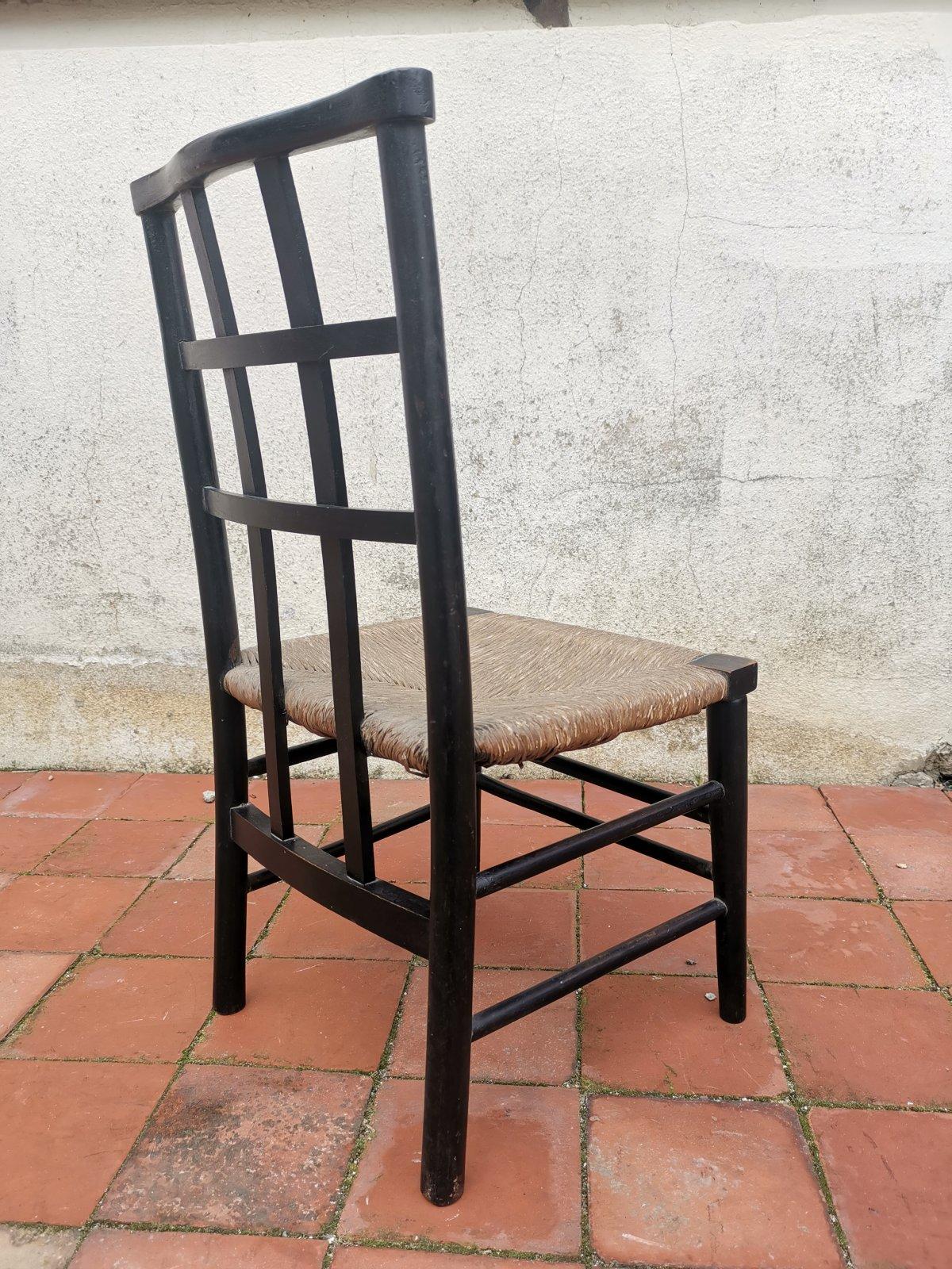 Ebonized Liberty And Co. An English Beech Rush Seated Lattice Back Children's Chair For Sale
