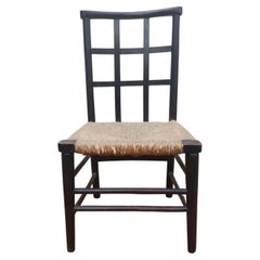 Liberty And Co. An English Beech Rush Seated Lattice Back Children's Chair