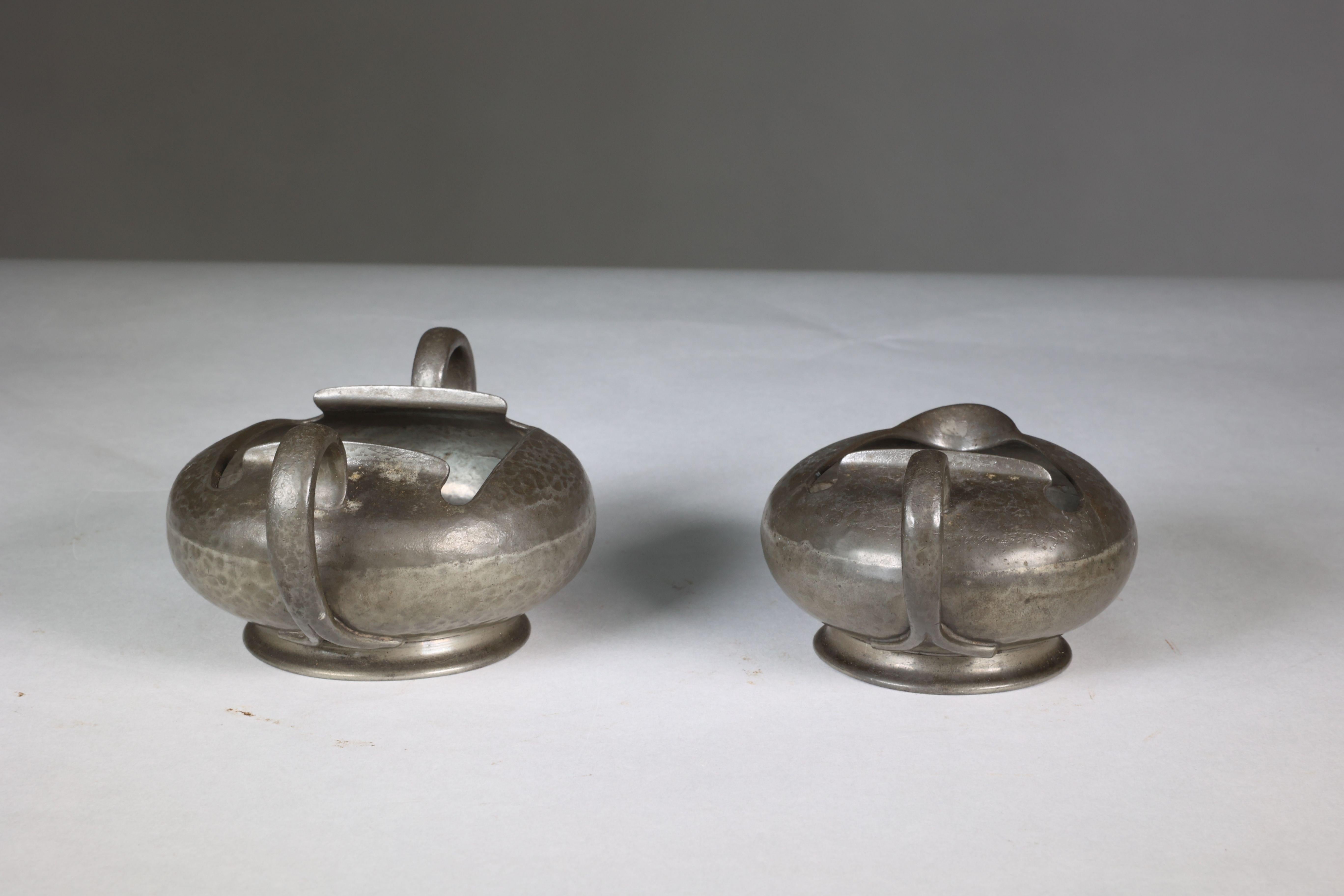 Early 20th Century Liberty and Co. An English Pewter 0966 Arts and Crafts milk and sugar bowl For Sale