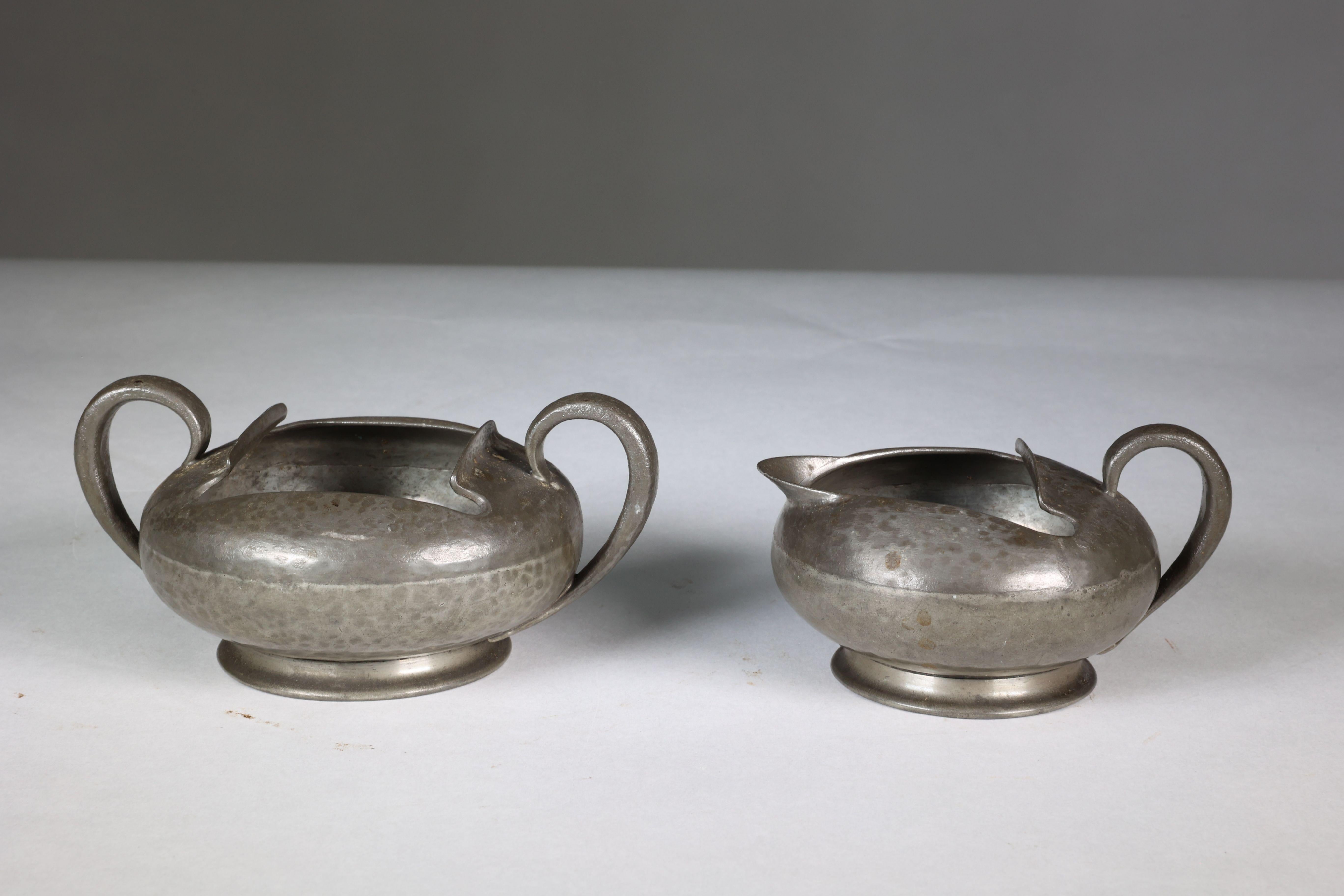 Liberty and Co. An English Pewter 0966 Arts and Crafts milk and sugar bowl For Sale 2