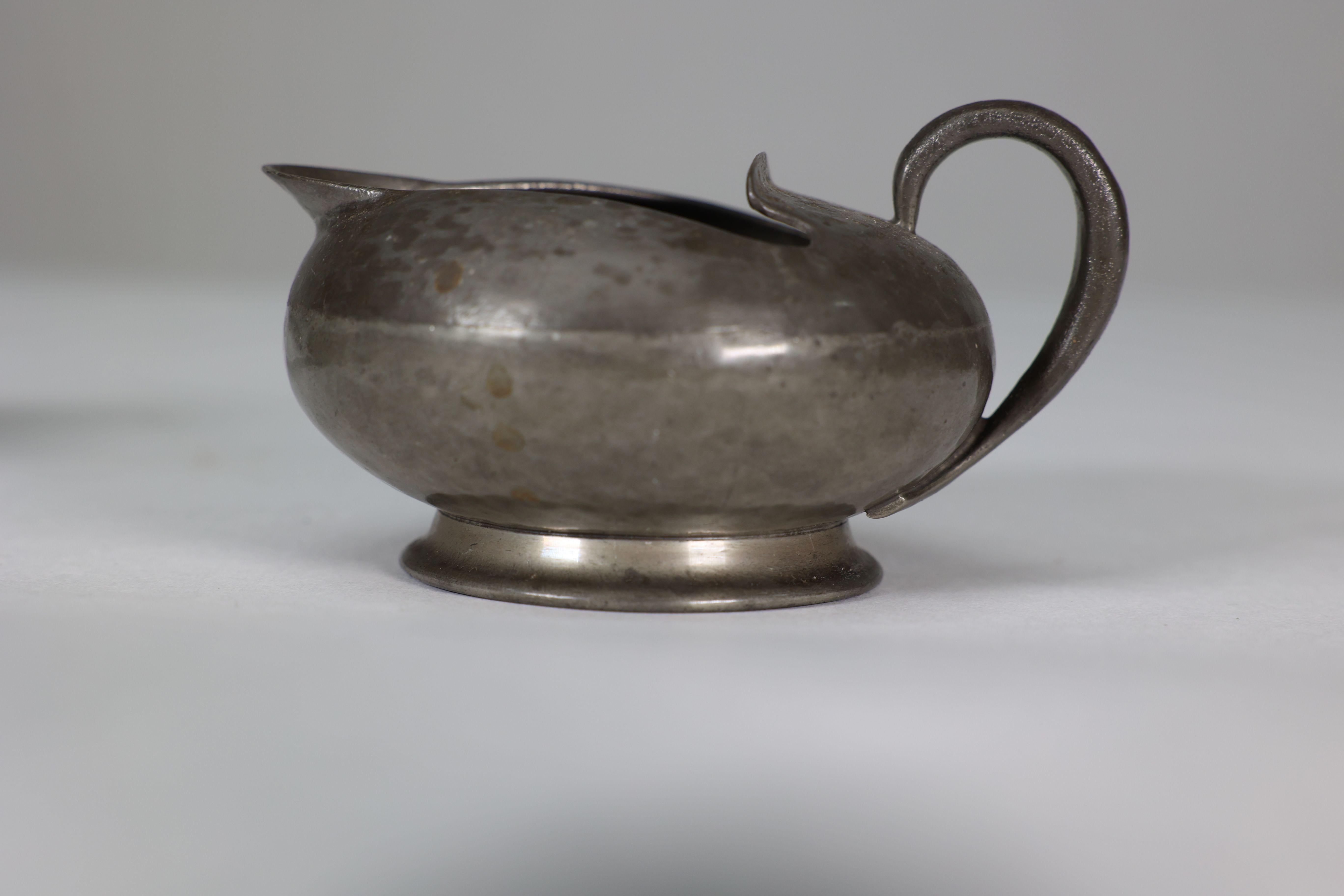 Liberty and Co. An English Pewter 0966 Arts and Crafts milk and sugar bowl For Sale 4
