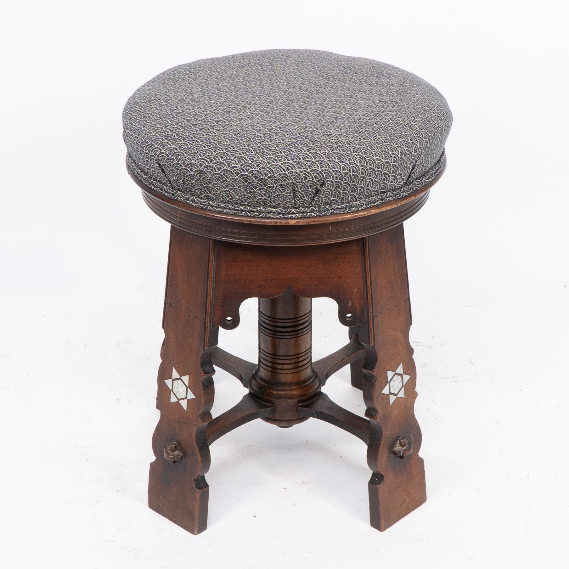 Arts and Crafts Liberty and Co attri. A rare Moorish walnut revolving stool with Moorish arches For Sale