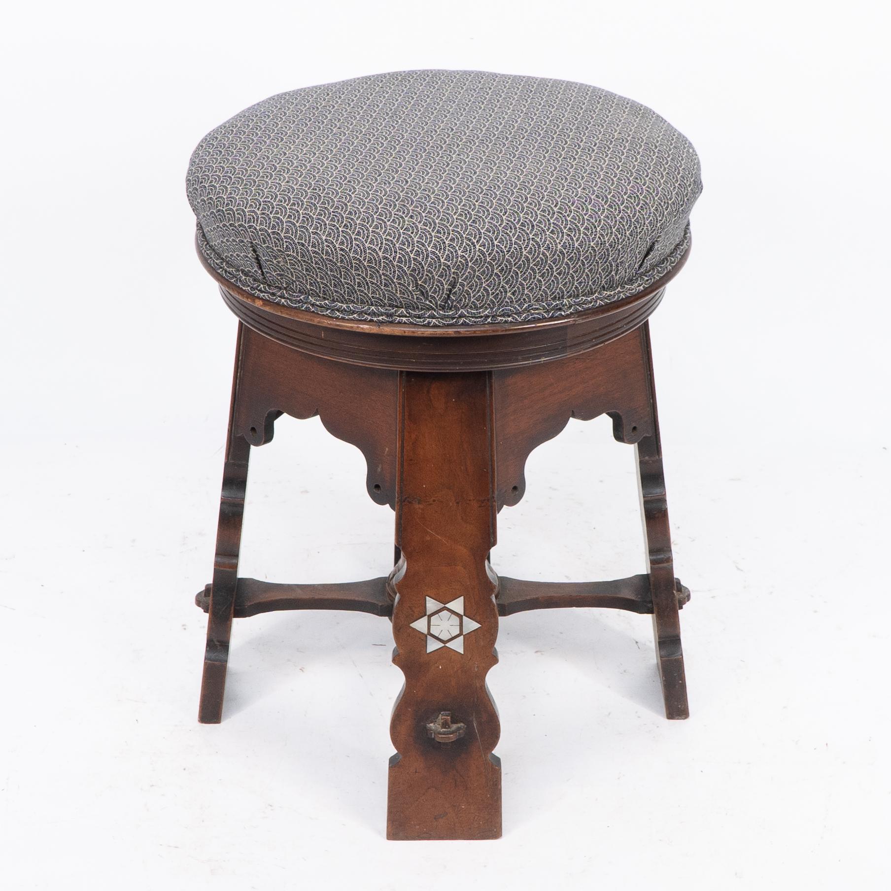 English Liberty and Co attri. A rare Moorish walnut revolving stool with Moorish arches For Sale