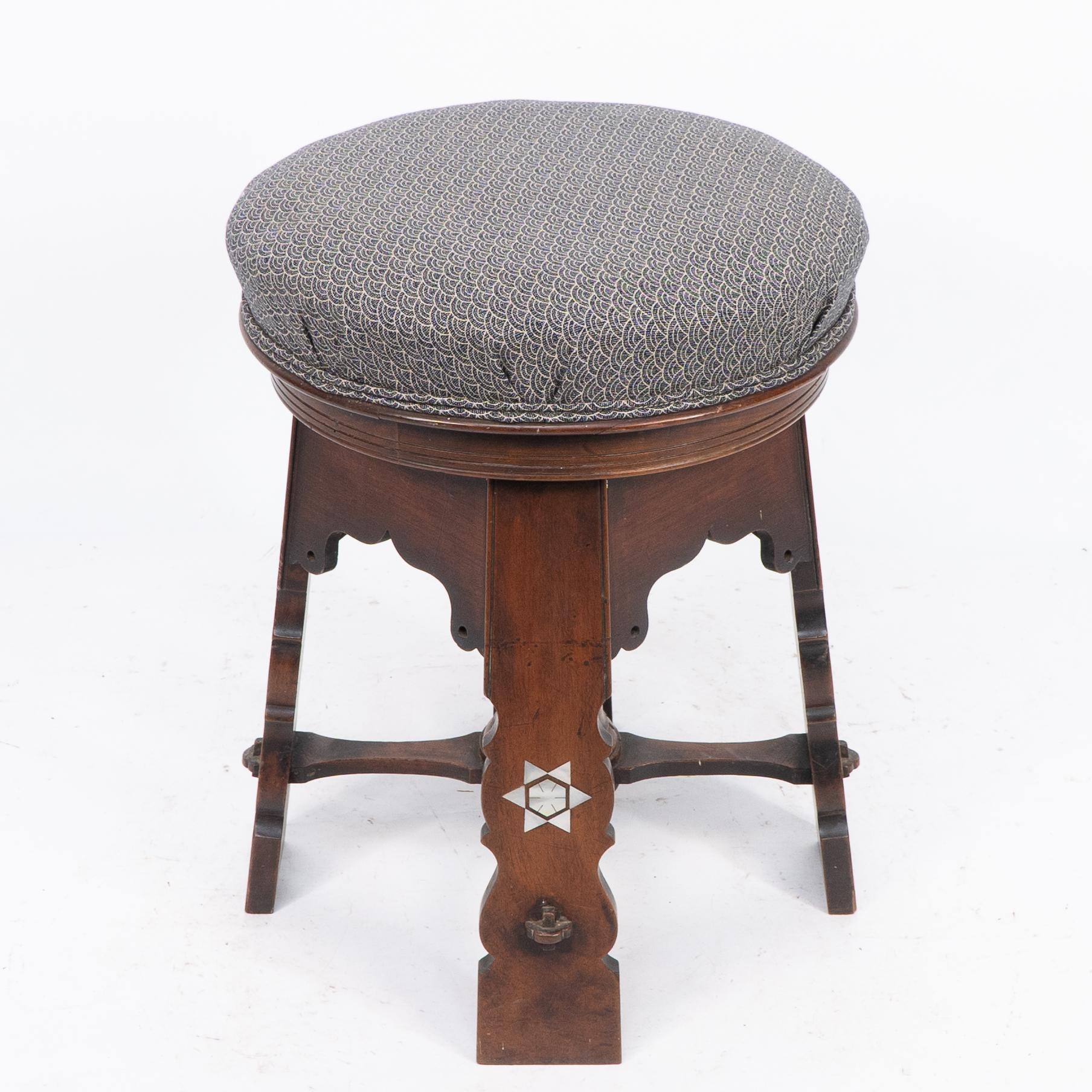 Liberty and Co attri. A rare Moorish walnut revolving stool with Moorish arches For Sale 1