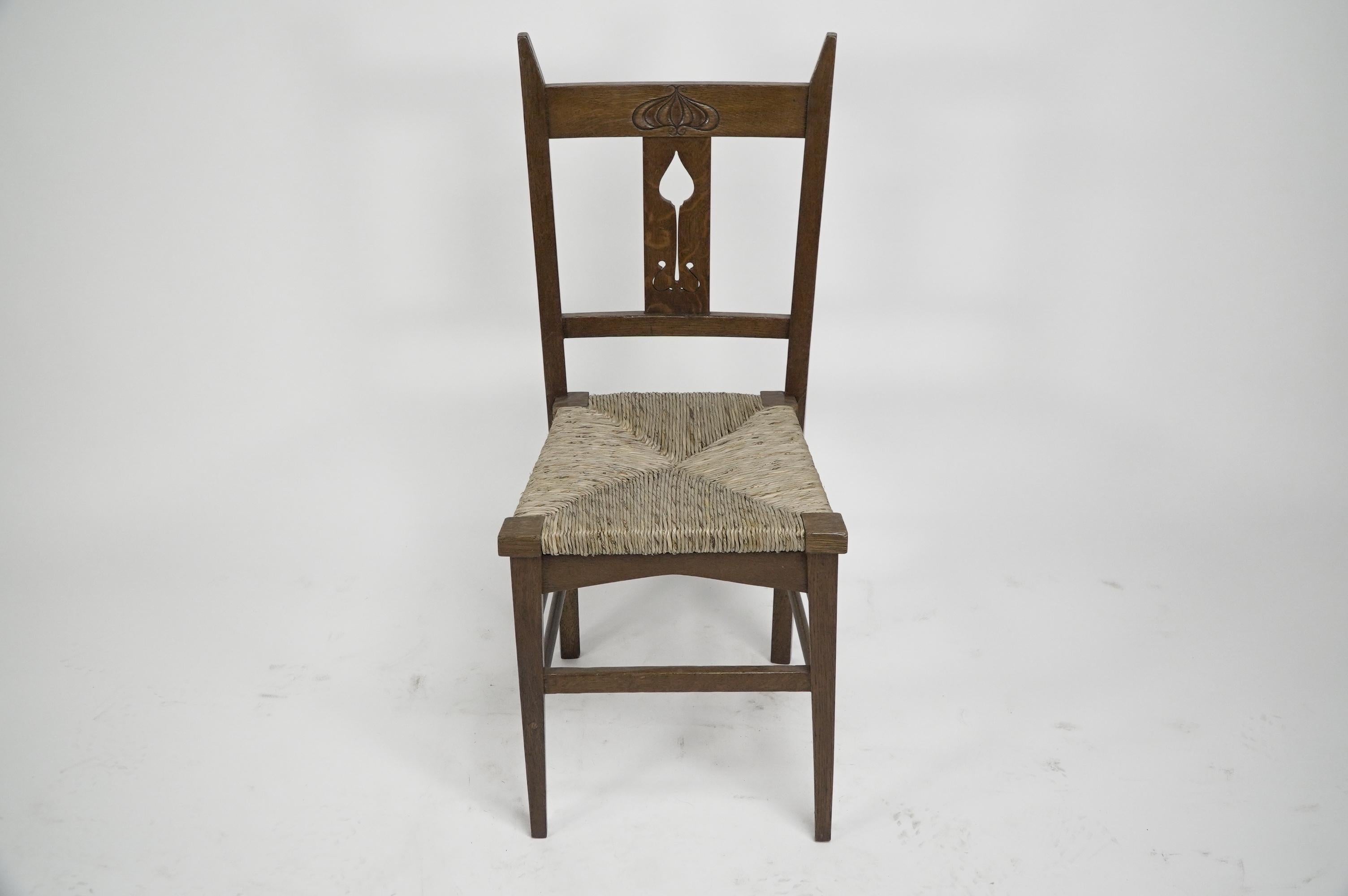Arts and Crafts Liberty & Co attributed. Set of six Glasgow Style oak & rush seat dining chairs. For Sale