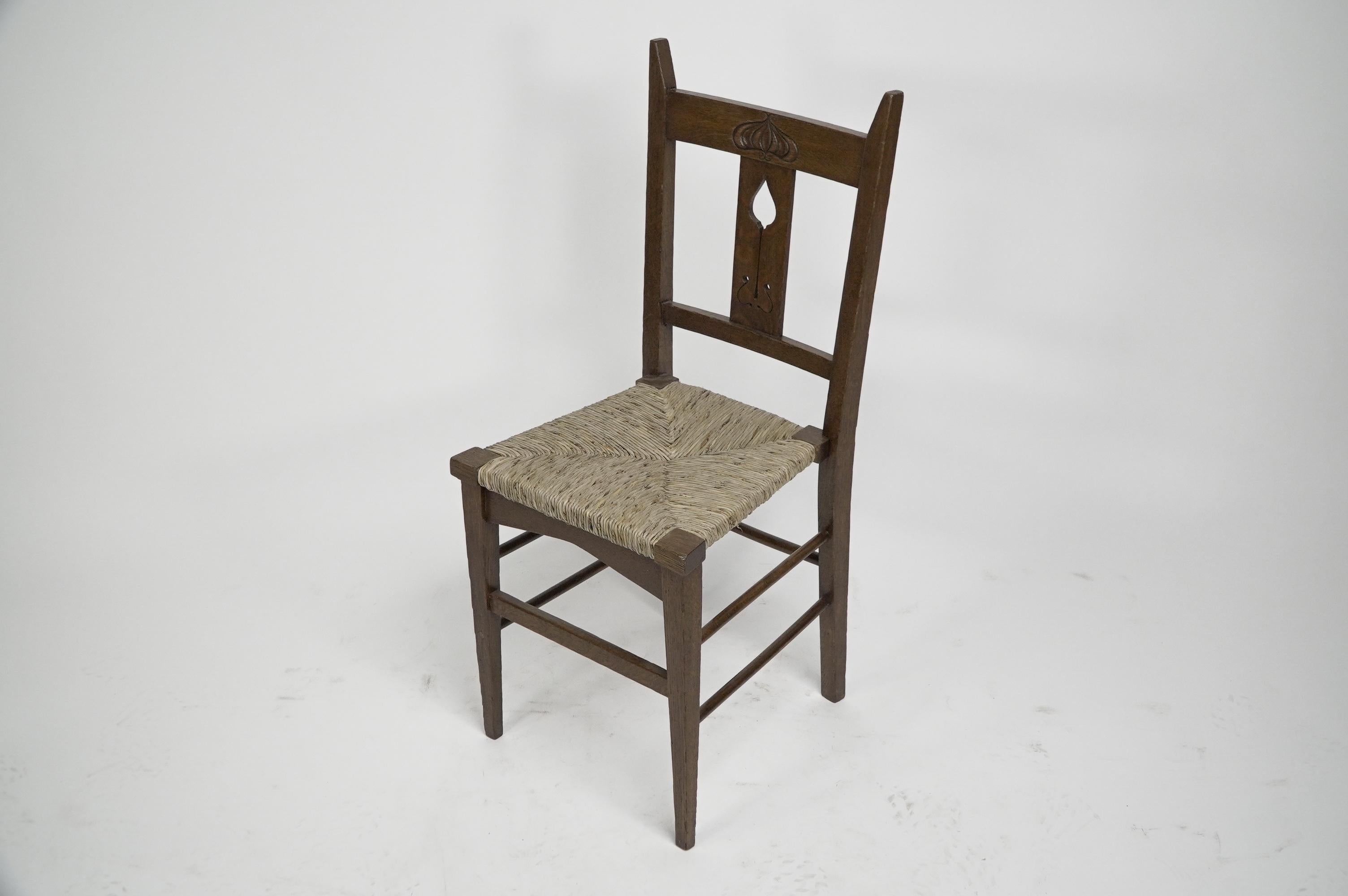 Liberty & Co attributed. Set of six Glasgow Style oak & rush seat dining chairs. In Good Condition For Sale In London, GB