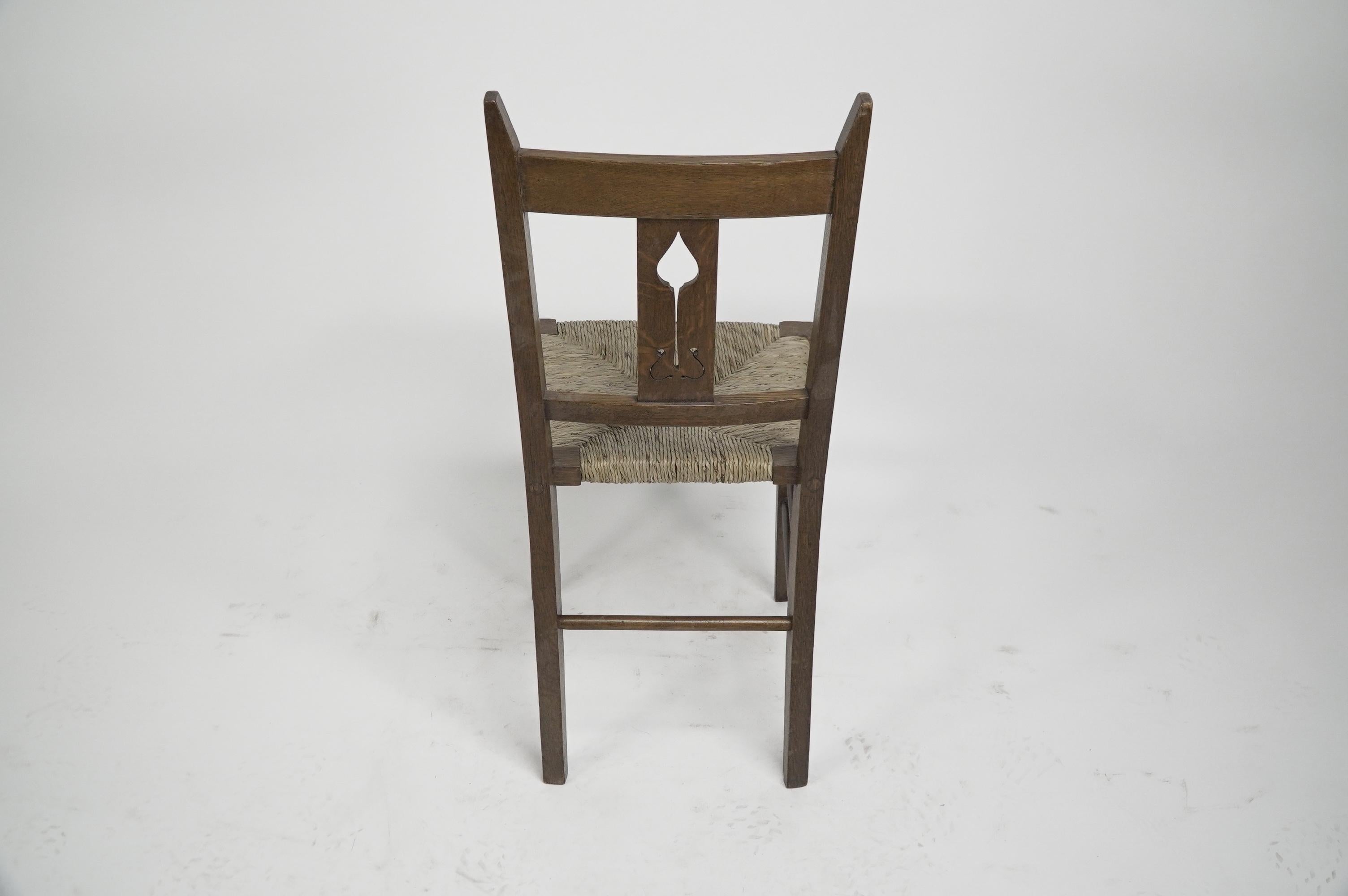 Liberty & Co attributed. Set of six Glasgow Style oak & rush seat dining chairs. For Sale 1