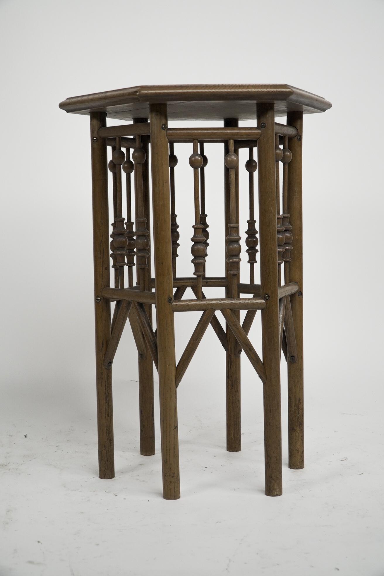 English Liberty and Co (attributed). A small Moorish Hexagon oak side table