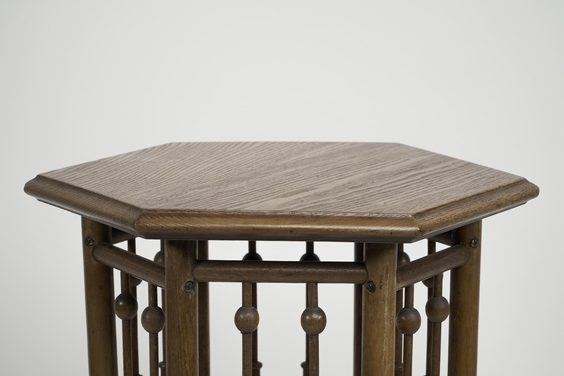 Late 19th Century Liberty and Co (attributed). A small Moorish Hexagon oak side table