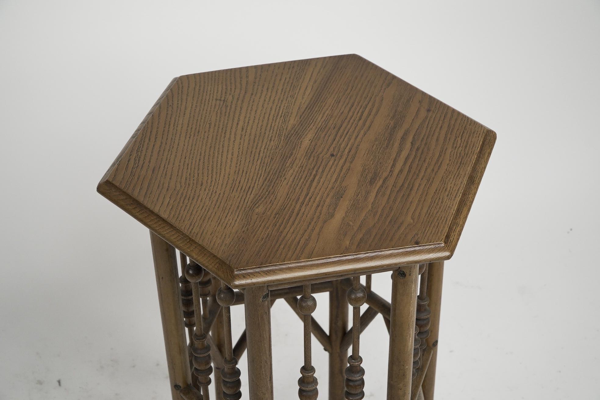 Oak Liberty and Co (attributed). A small Moorish Hexagon oak side table For Sale
