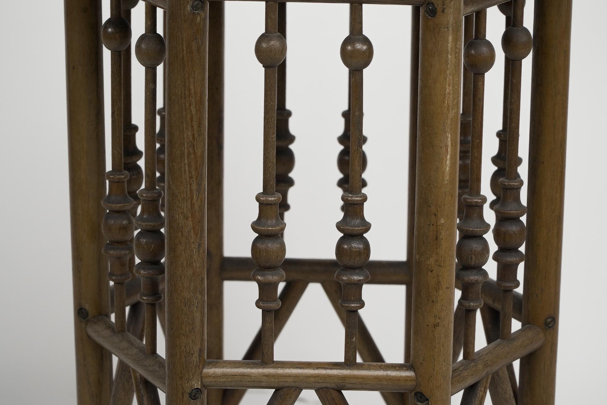 Liberty and Co (attributed). A small Moorish Hexagon oak side table 1