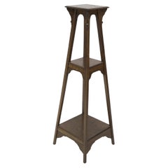 Liberty and Co (attributed). An Arts and Crafts oak plant stand