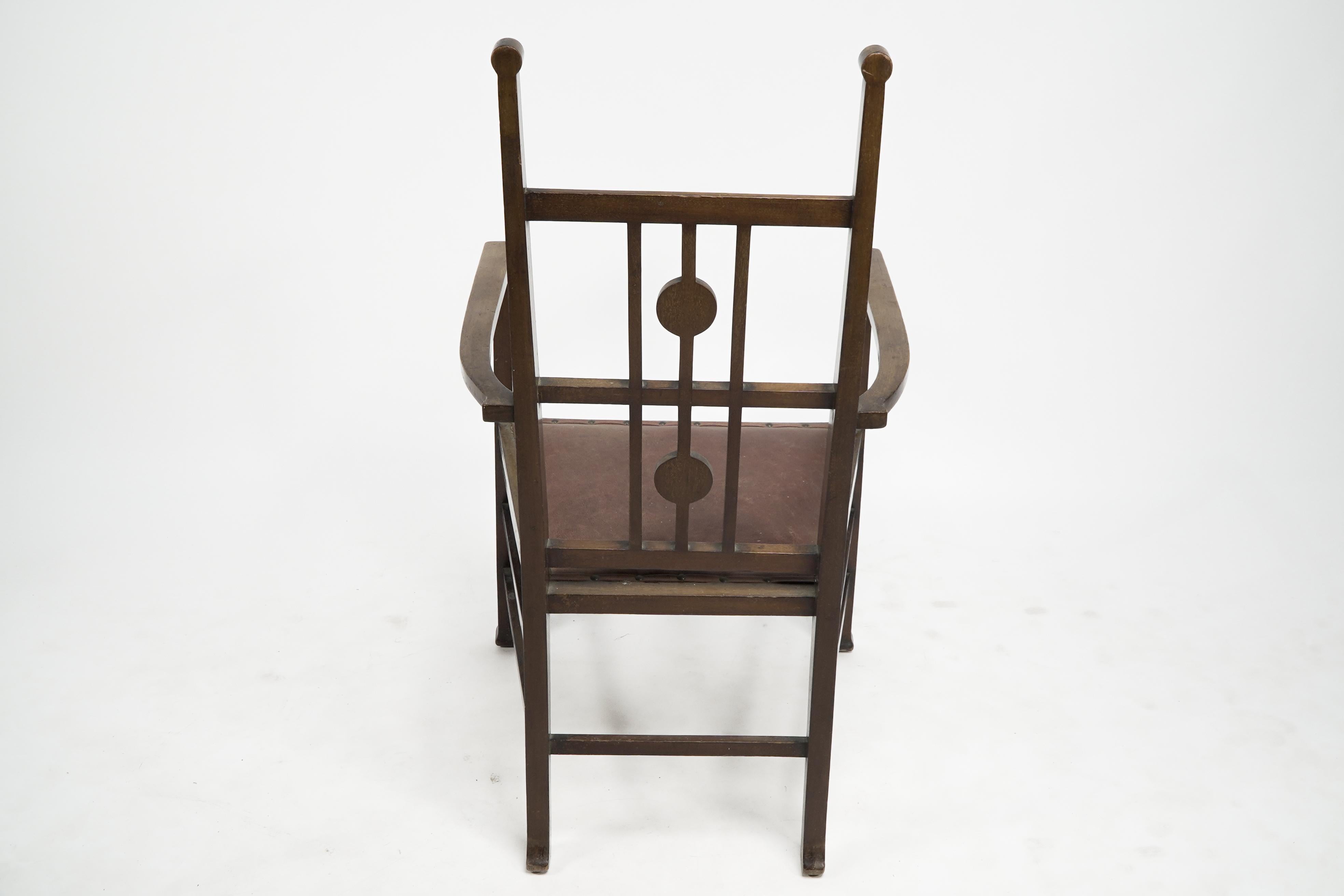 Liberty and Co. attributed. An Arts & Crafts walnut armchair with floral inlays. For Sale 6
