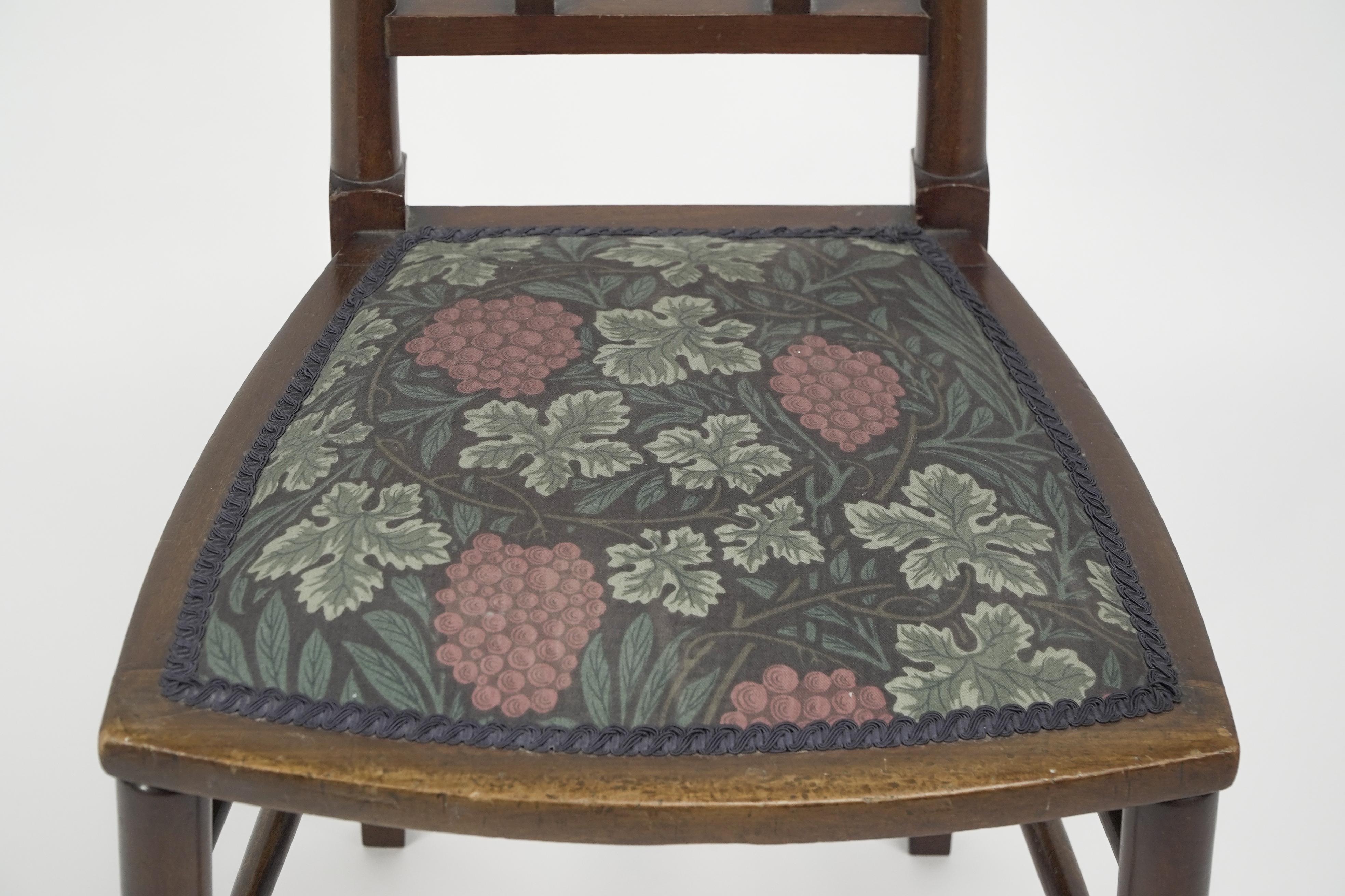 E G Punnett for Liberty & Co. A Walnut side chair with inlaid floral decoration. For Sale 6