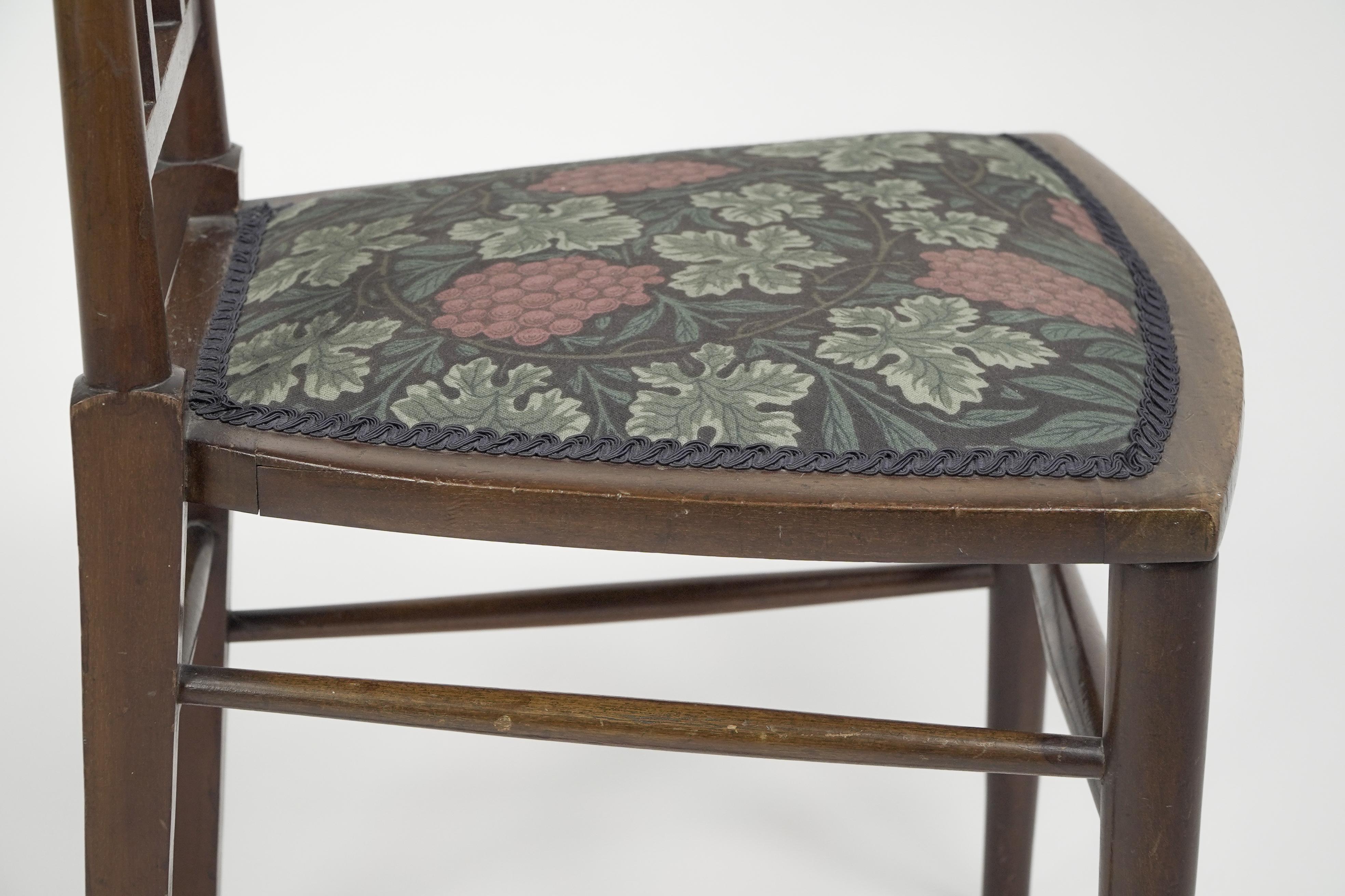 E G Punnett for Liberty & Co. A Walnut side chair with inlaid floral decoration. For Sale 8