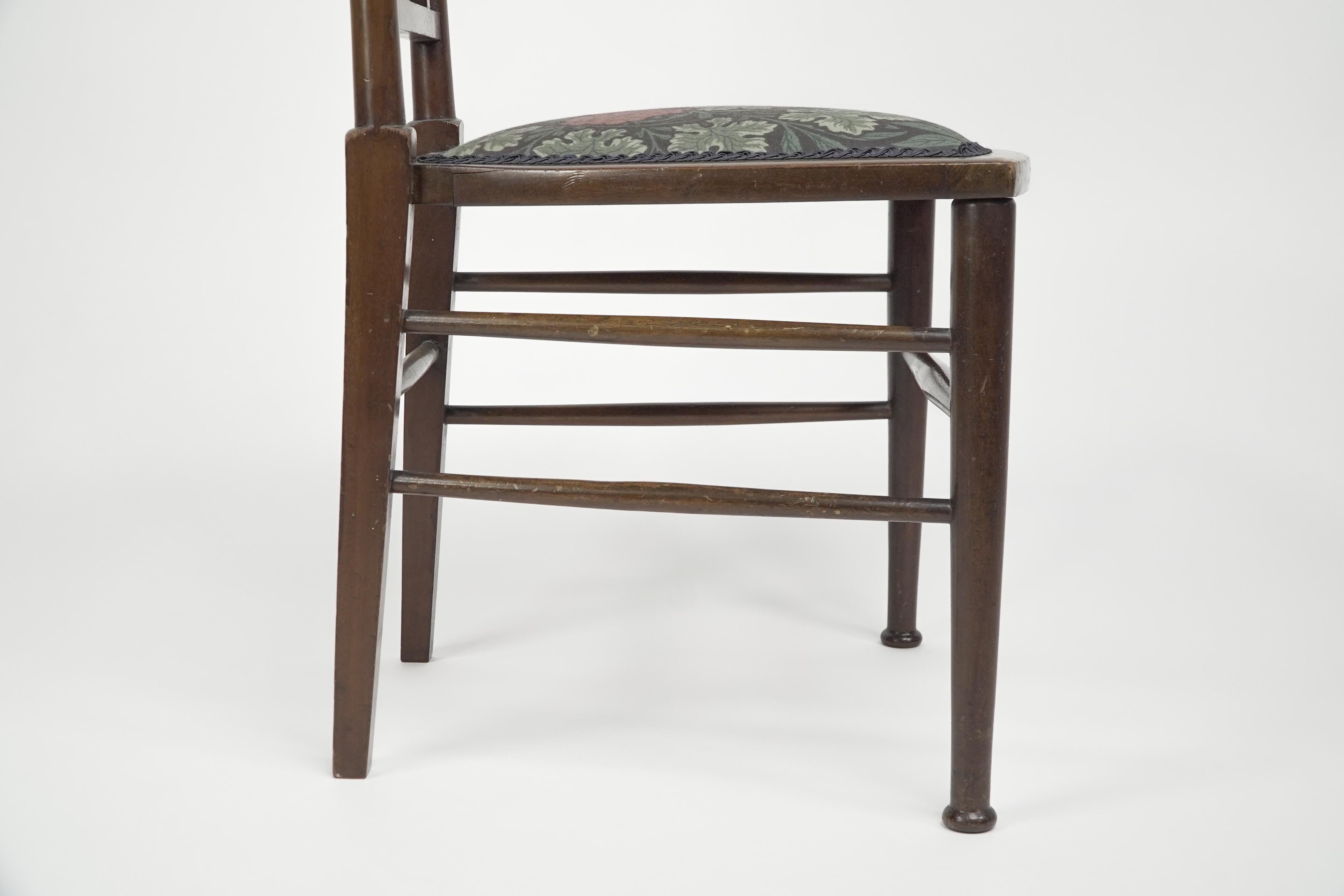 E G Punnett for Liberty & Co. A Walnut side chair with inlaid floral decoration. For Sale 9