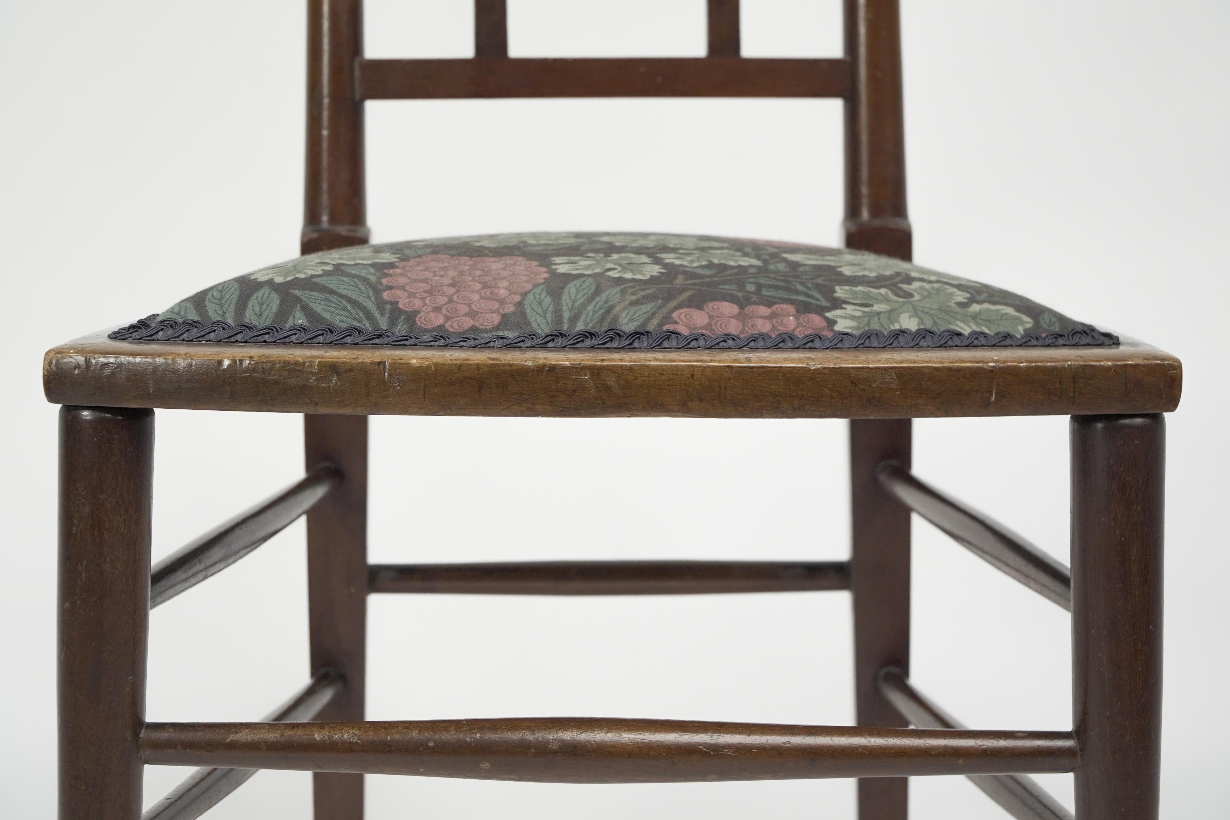 E G Punnett for Liberty & Co. A Walnut side chair with inlaid floral decoration. For Sale 5