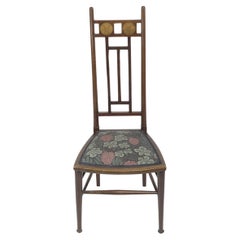 Liberty and Co. Designed by E G Punnett A Walnut side or bedroom chair
