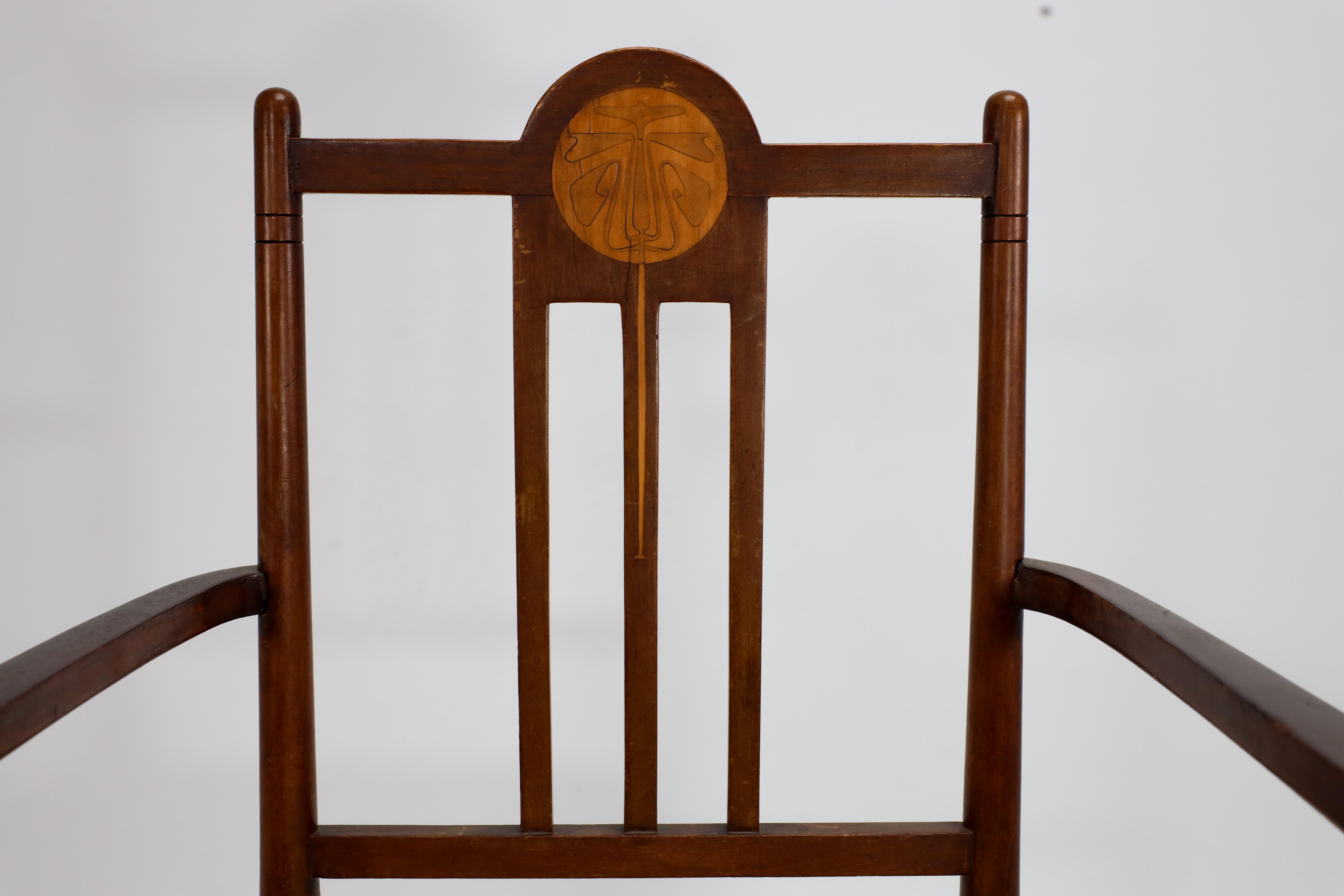 Liberty and Co in the style of G M Ellwood. An Arts and Crafts Walnut armchair For Sale 2