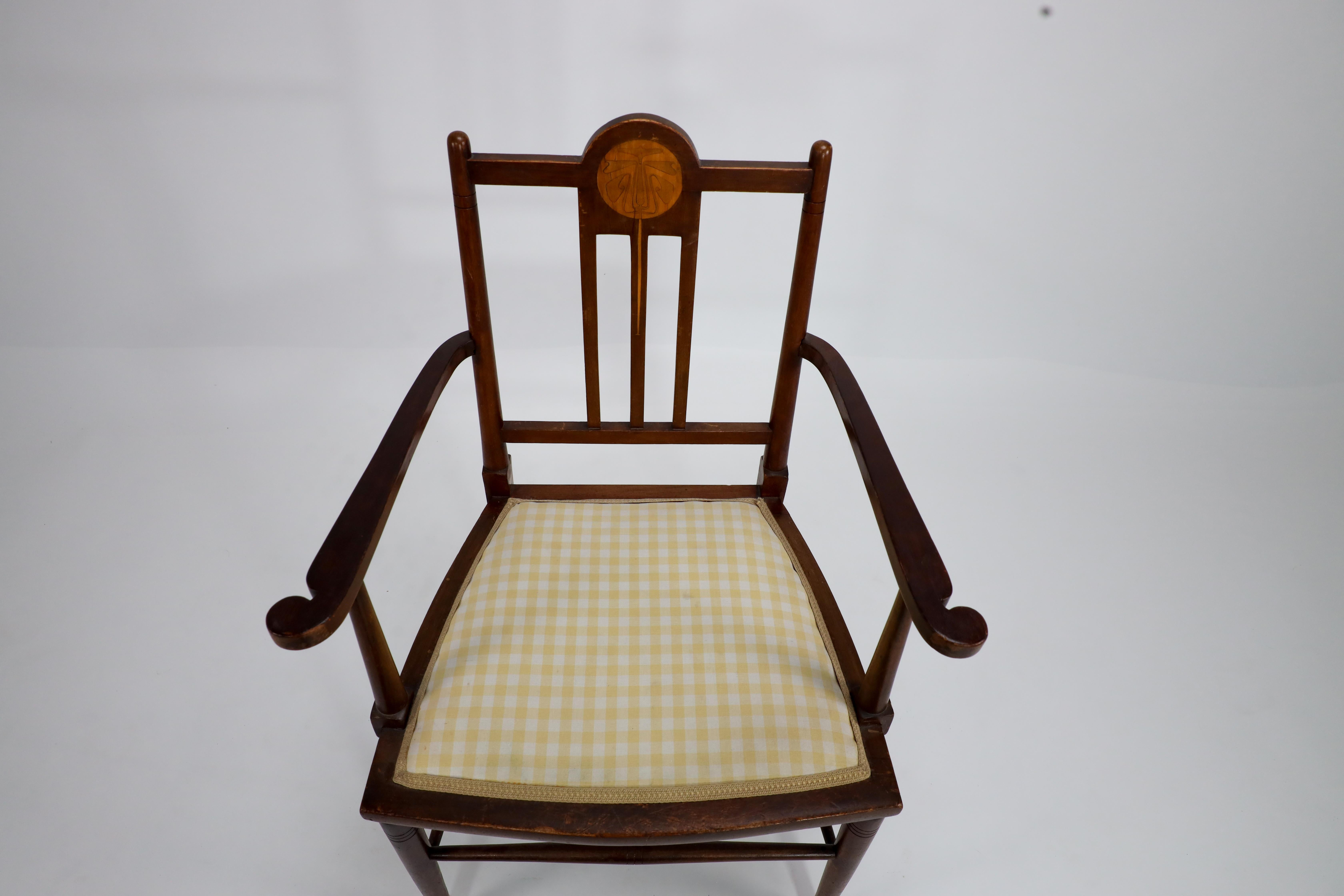 Liberty and Co in the style of G M Ellwood. An Arts and Crafts Walnut armchair For Sale 5