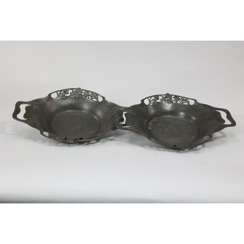 Early 20th Century Liberty and Co made by William Haseler. A pair of Arts and Crafts pewter trays. For Sale