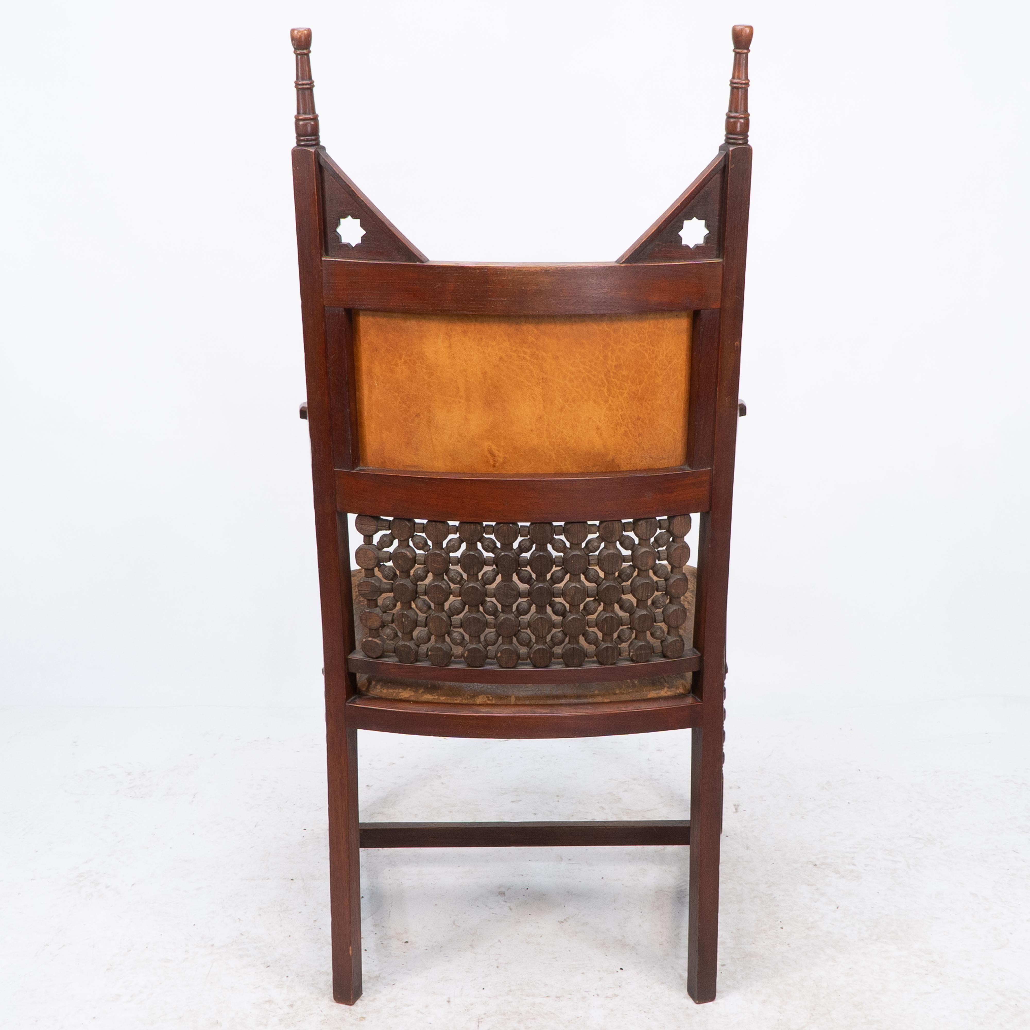 Liberty & Co. A Moorish Arts & Crafts walnut armchair with original leather seat For Sale 10