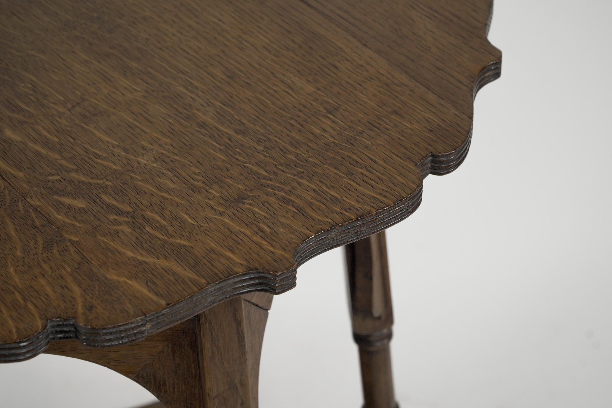 Liberty and Co. Oak side or occasional table with a shaped top and molded edges In Good Condition In London, GB