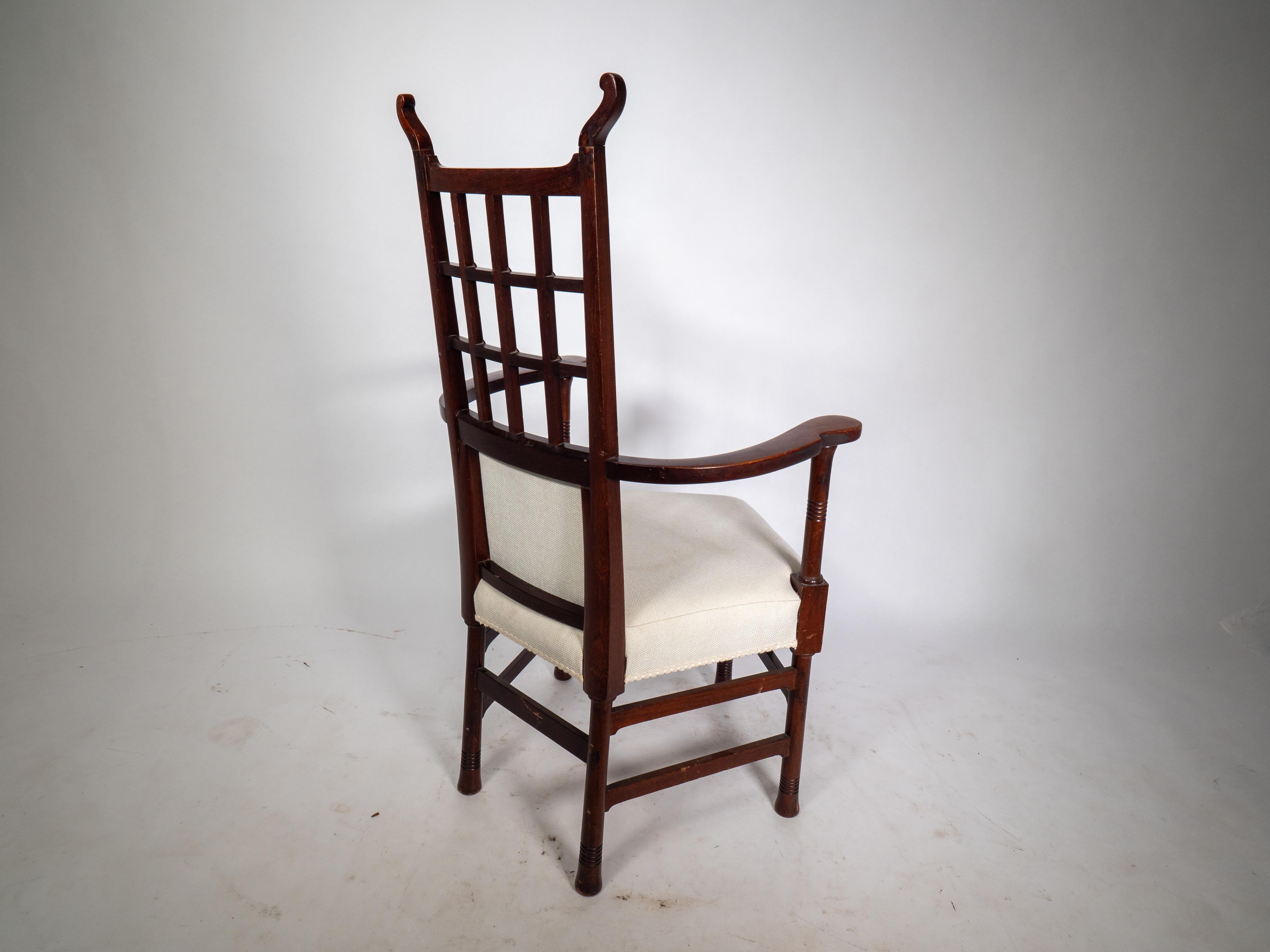 Liberty & Co probably made by William Birch. An Arts & Crafts mahogany armchair. For Sale 4