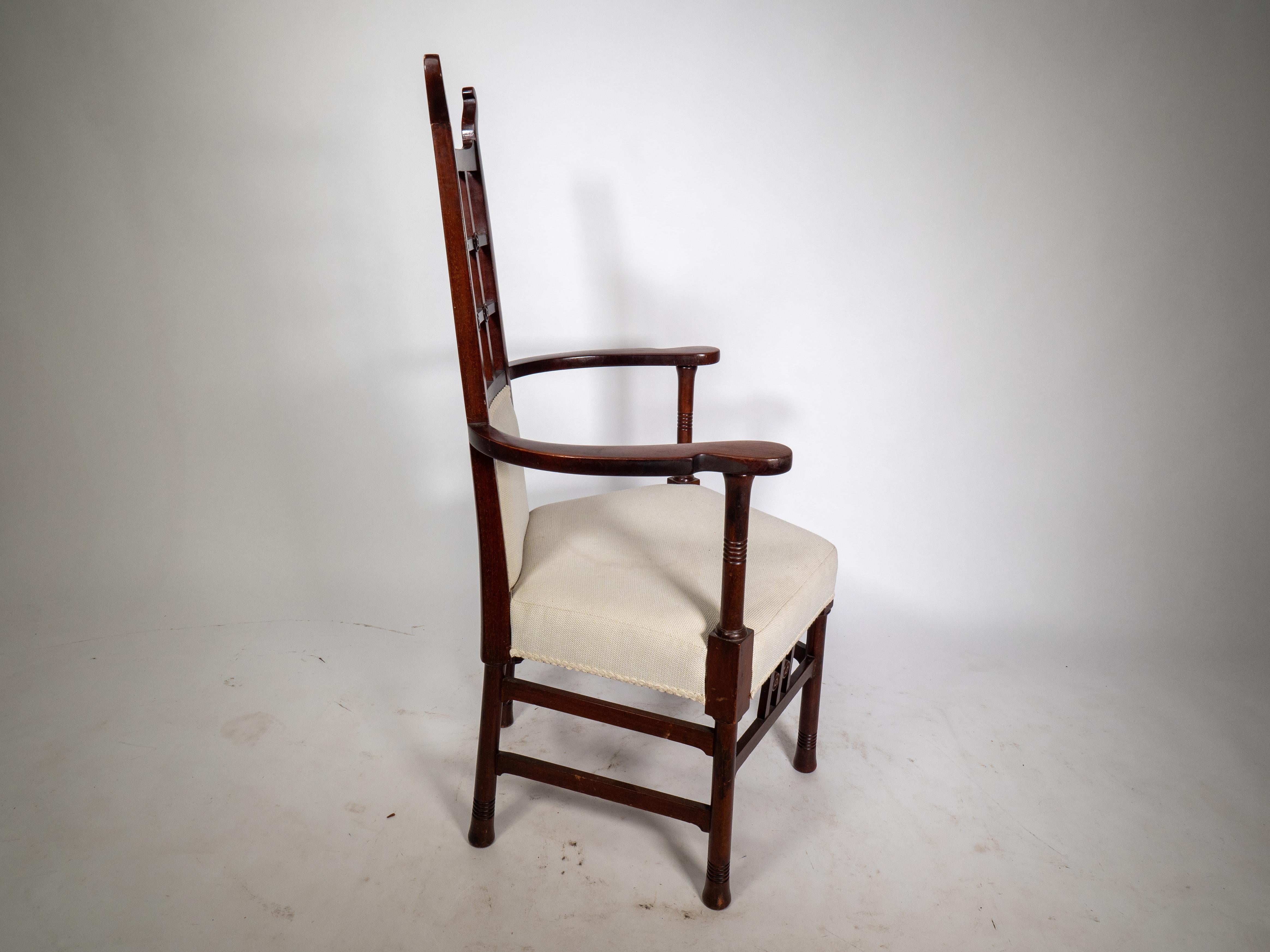 Mahogany Liberty & Co probably made by William Birch. An Arts & Crafts mahogany armchair. For Sale
