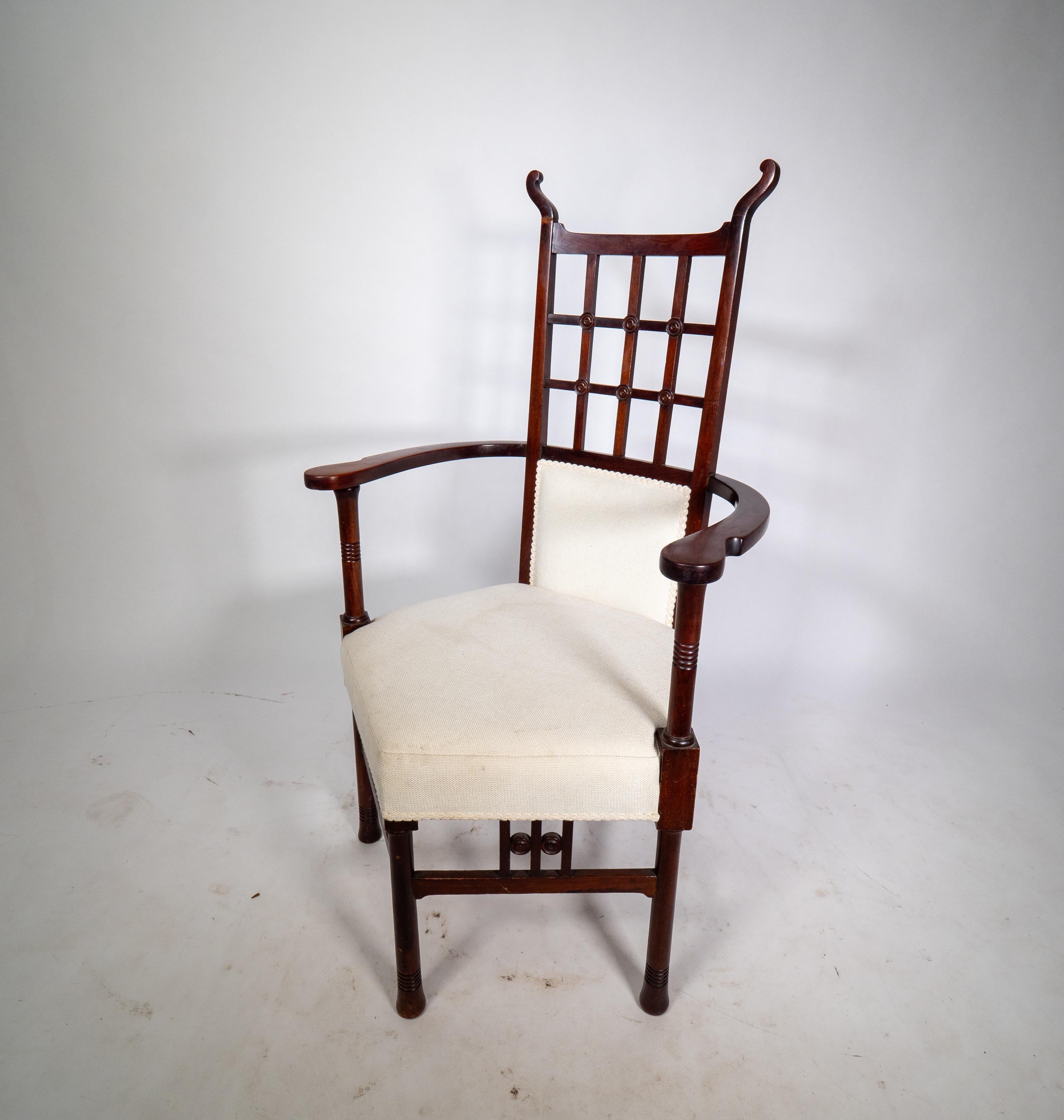 Liberty & Co probably made by William Birch. An Arts & Crafts mahogany armchair. In Good Condition For Sale In London, GB