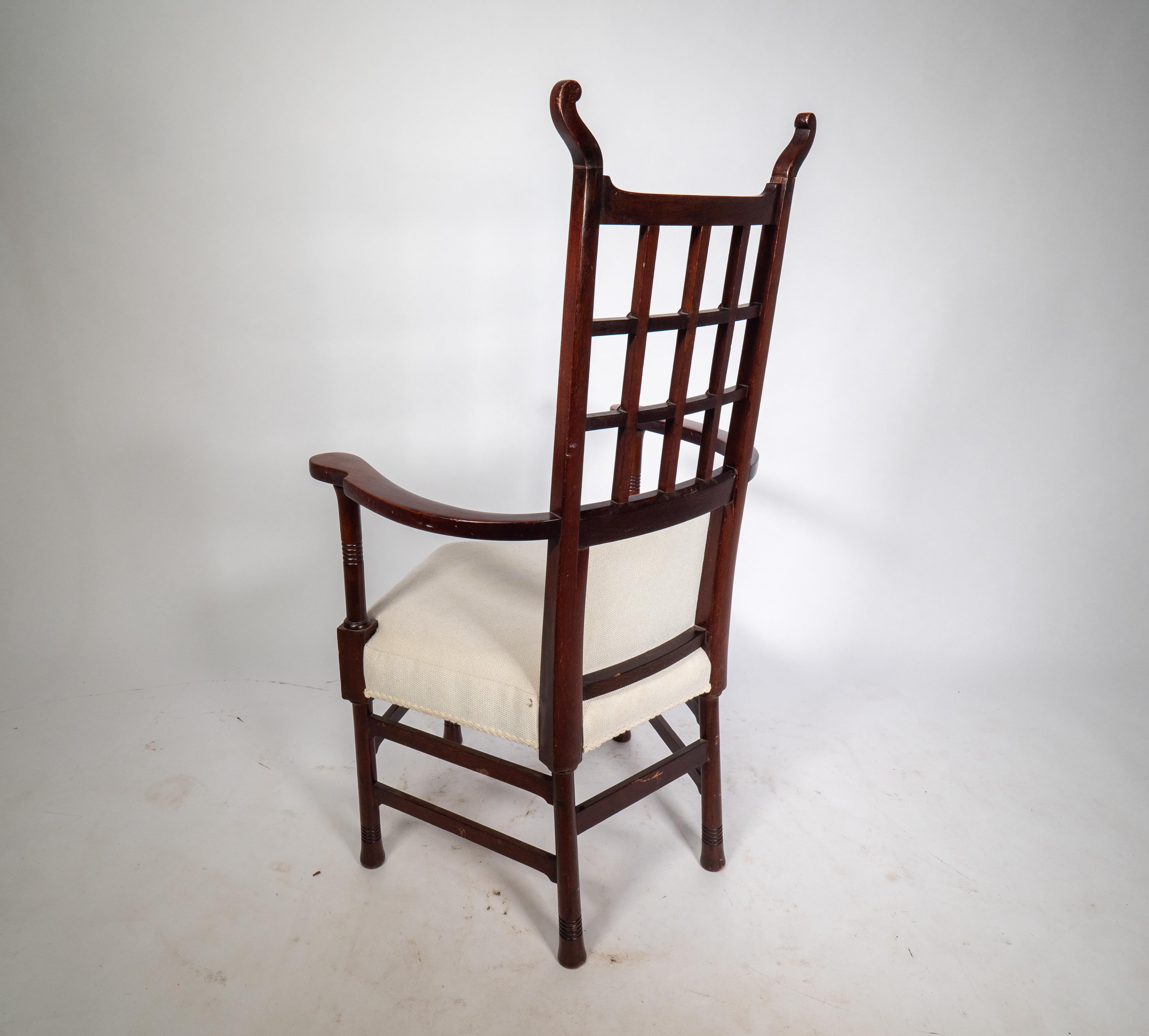 Liberty & Co probably made by William Birch. An Arts & Crafts mahogany armchair. For Sale 2