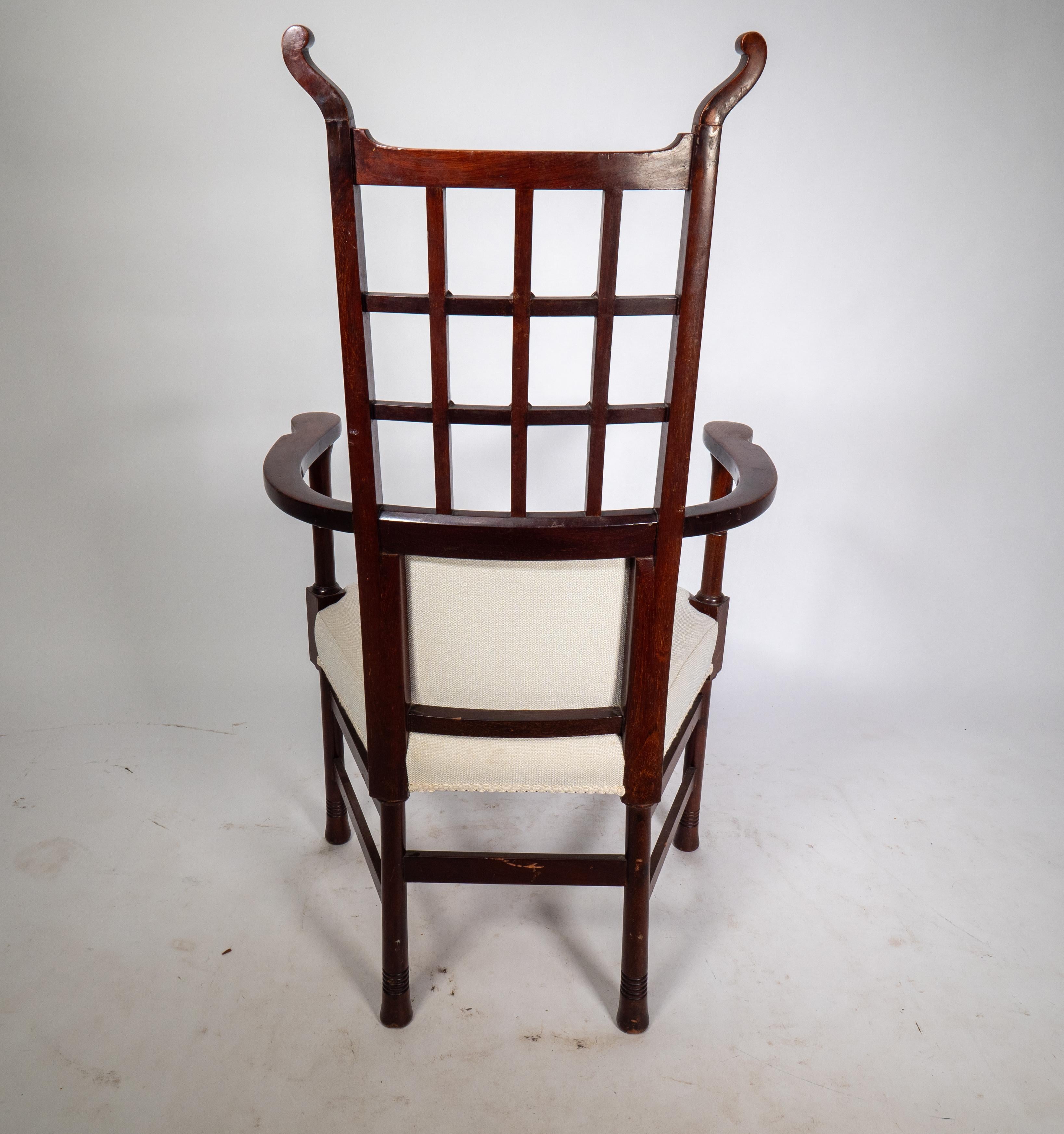Liberty & Co probably made by William Birch. An Arts & Crafts mahogany armchair. For Sale 3