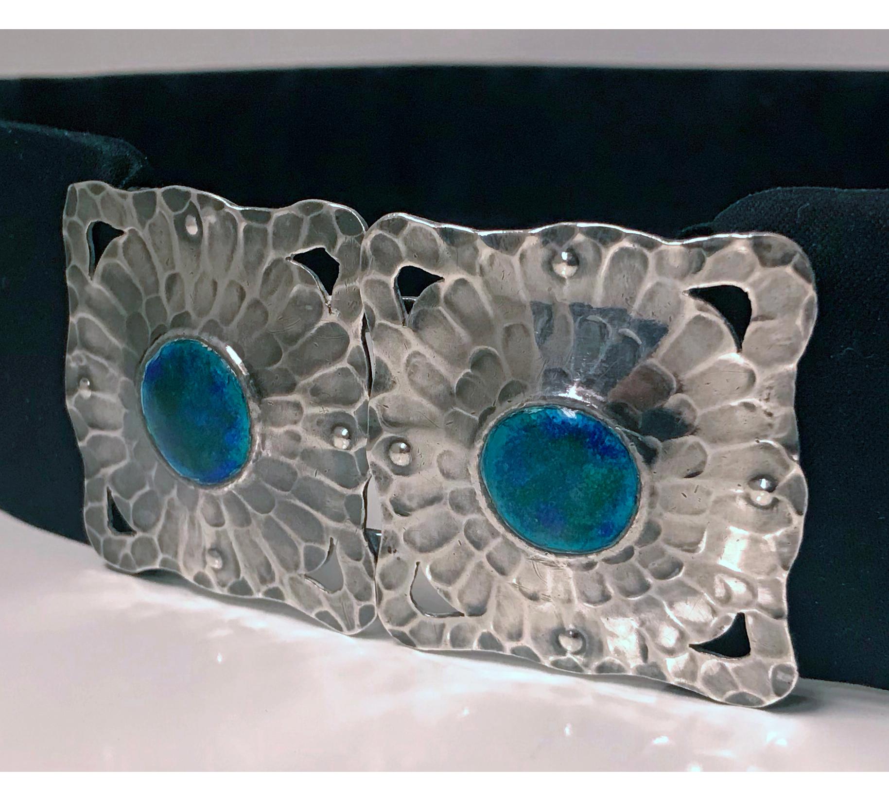 Liberty and Co Art Nouveau Arts and Crafts Silver Enamel Buckle. The rare design Sterling two piece enamel buckle waist clasp hallmarked Birmingham 1909 with Liberty mark. Dimensional hammered cut out design with a large turquoise blue green raised