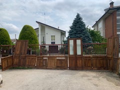 Liberty boiserie in walnut with carved panels and three double doors (one glass)