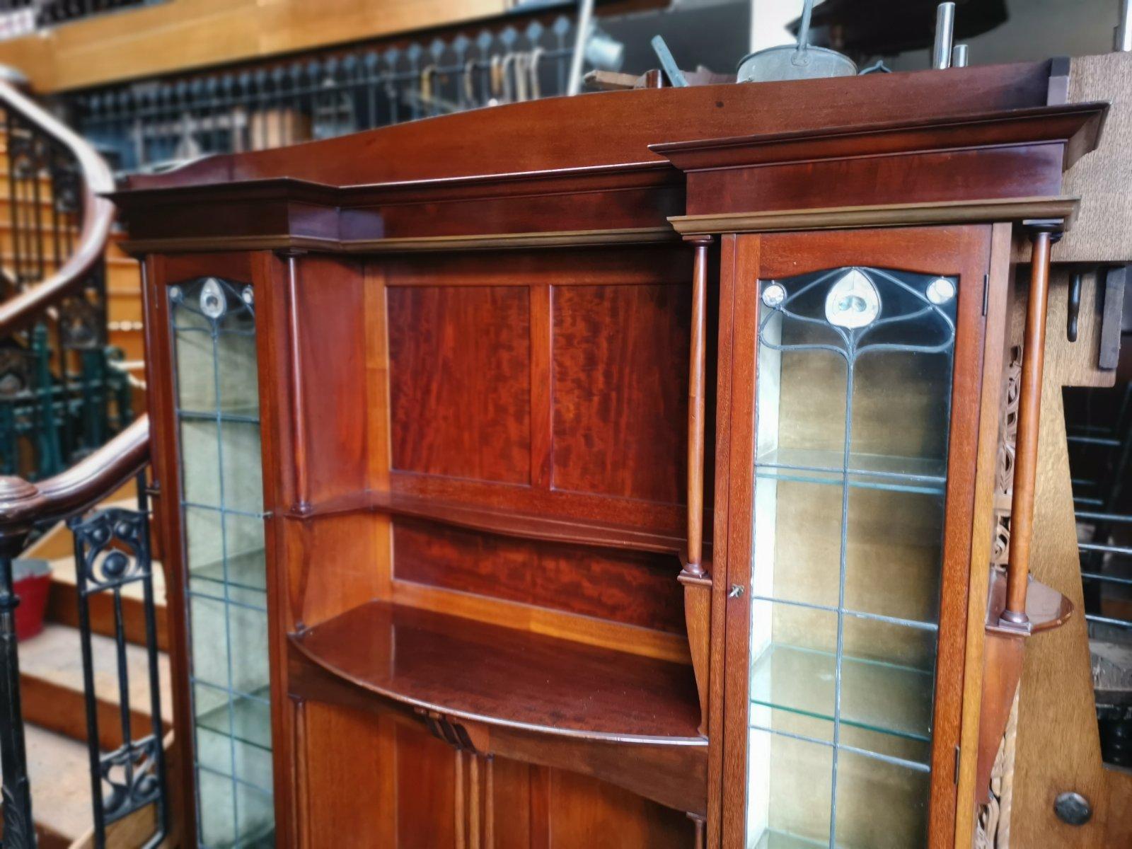 Liberty & Co. a Mahogany Display Cabinet with Floral Mother of Pearl Decoration In Good Condition For Sale In London, GB