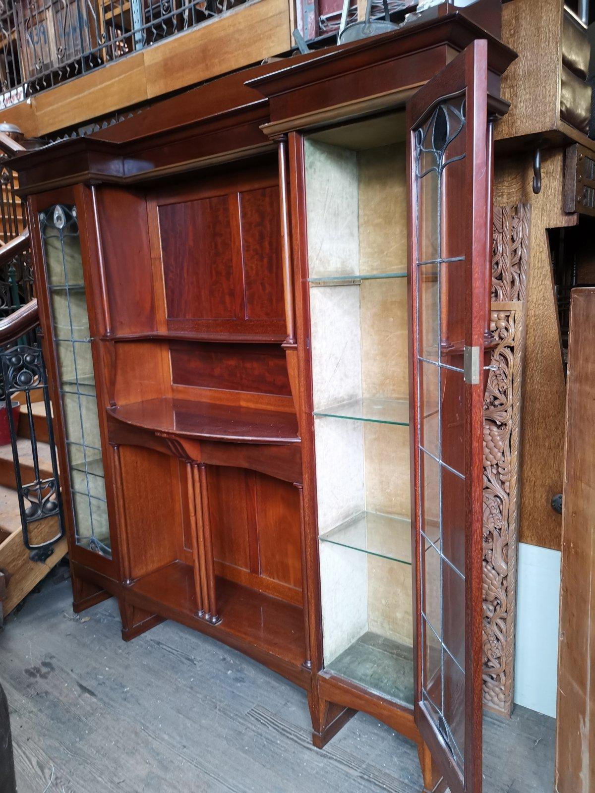 Arts and Crafts Liberty & Co. a Mahogany Display Cabinet with Floral Mother of Pearl Decoration For Sale