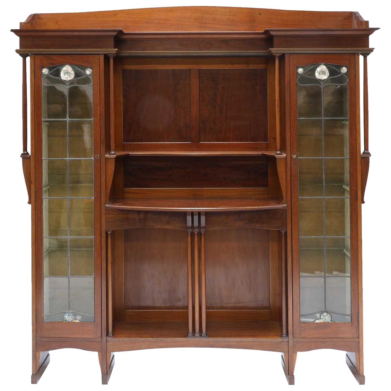 Liberty & Co. a Mahogany Display Cabinet with Floral Mother of Pearl Decoration