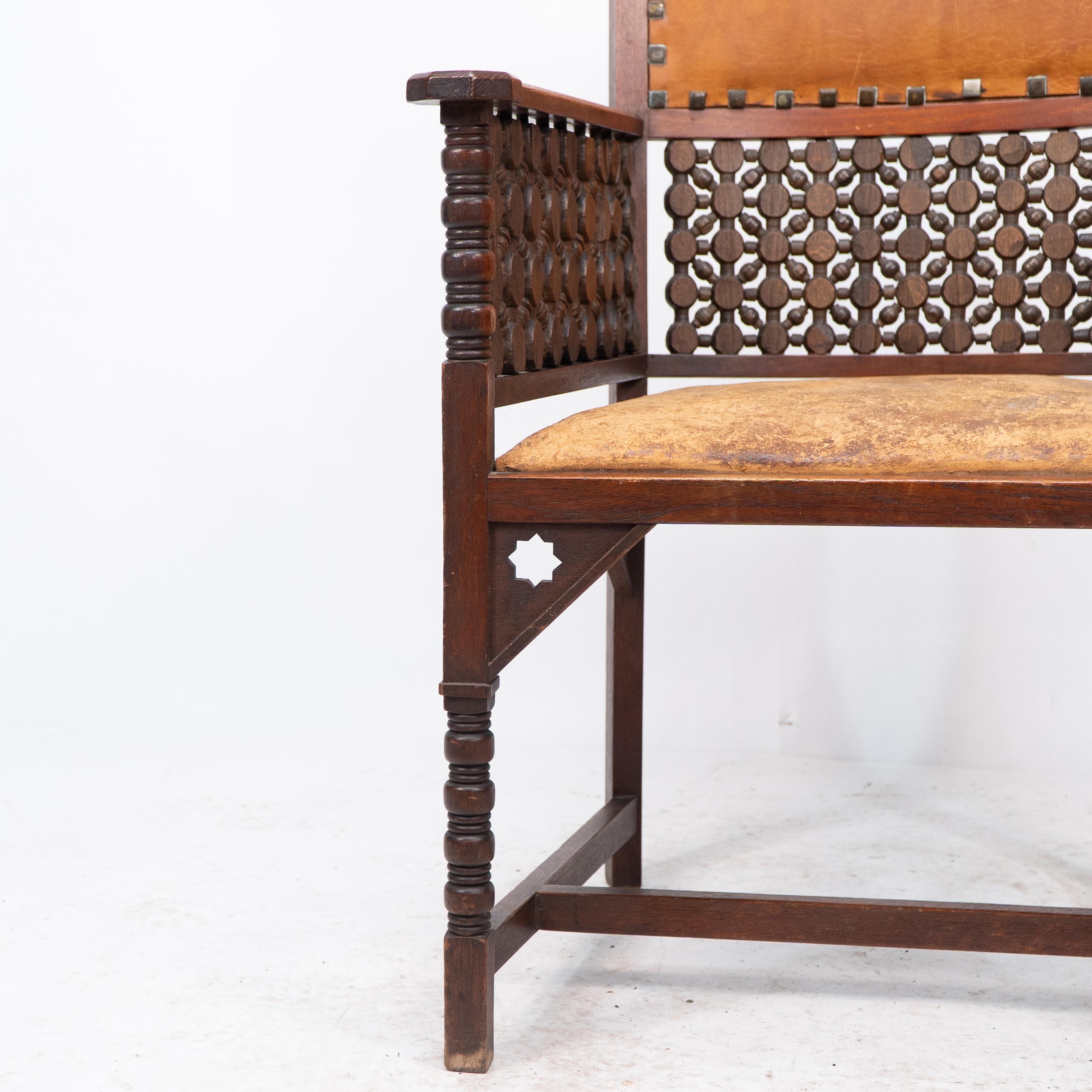 Liberty & Co. A Moorish Arts & Crafts walnut armchair with original leather seat For Sale 5